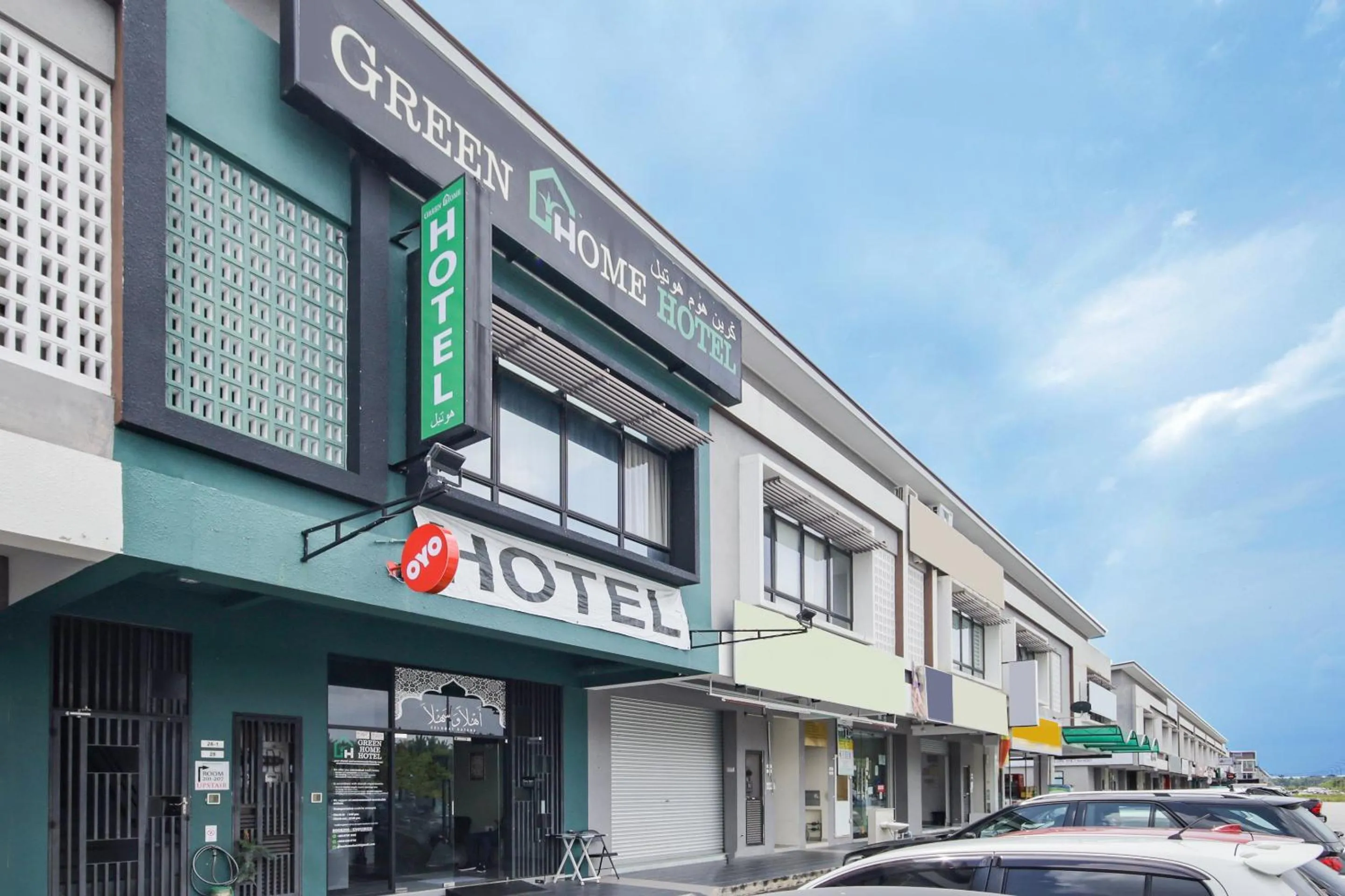 Facade/entrance in OYO 90399 Green Home Hotel syariah