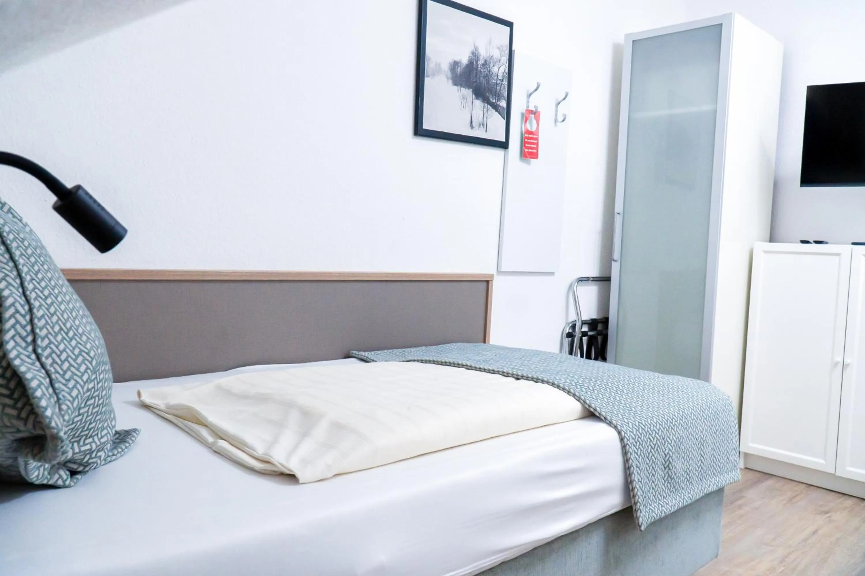 Bed in Stadt-gut-Hotel Rheinischer Hof