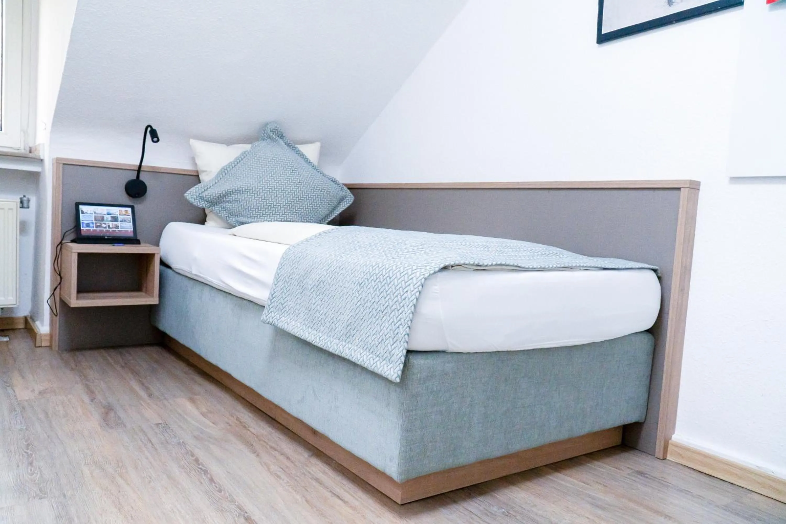 Bed in Stadt-gut-Hotel Rheinischer Hof