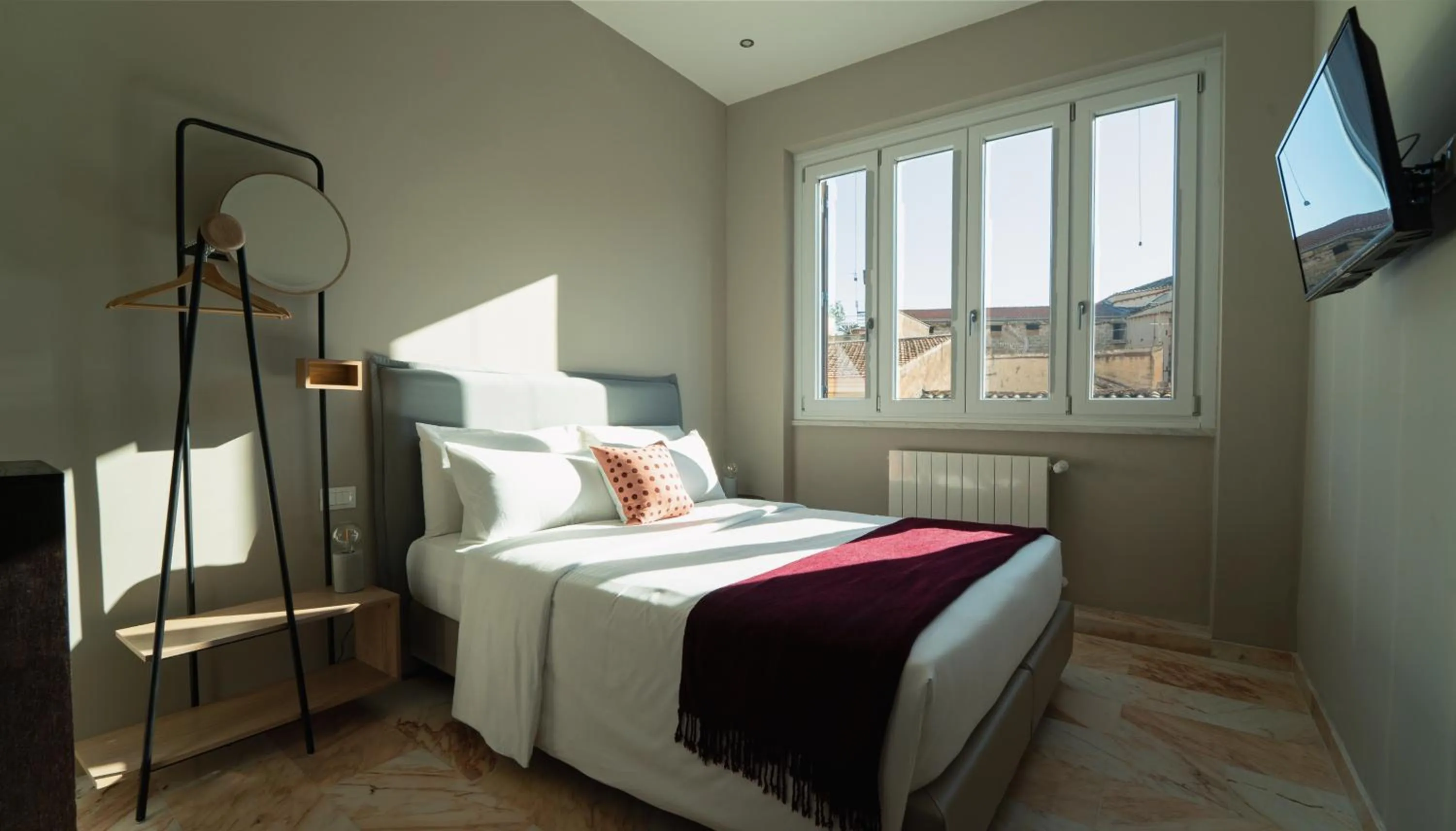 Bed in Zefiro Suites