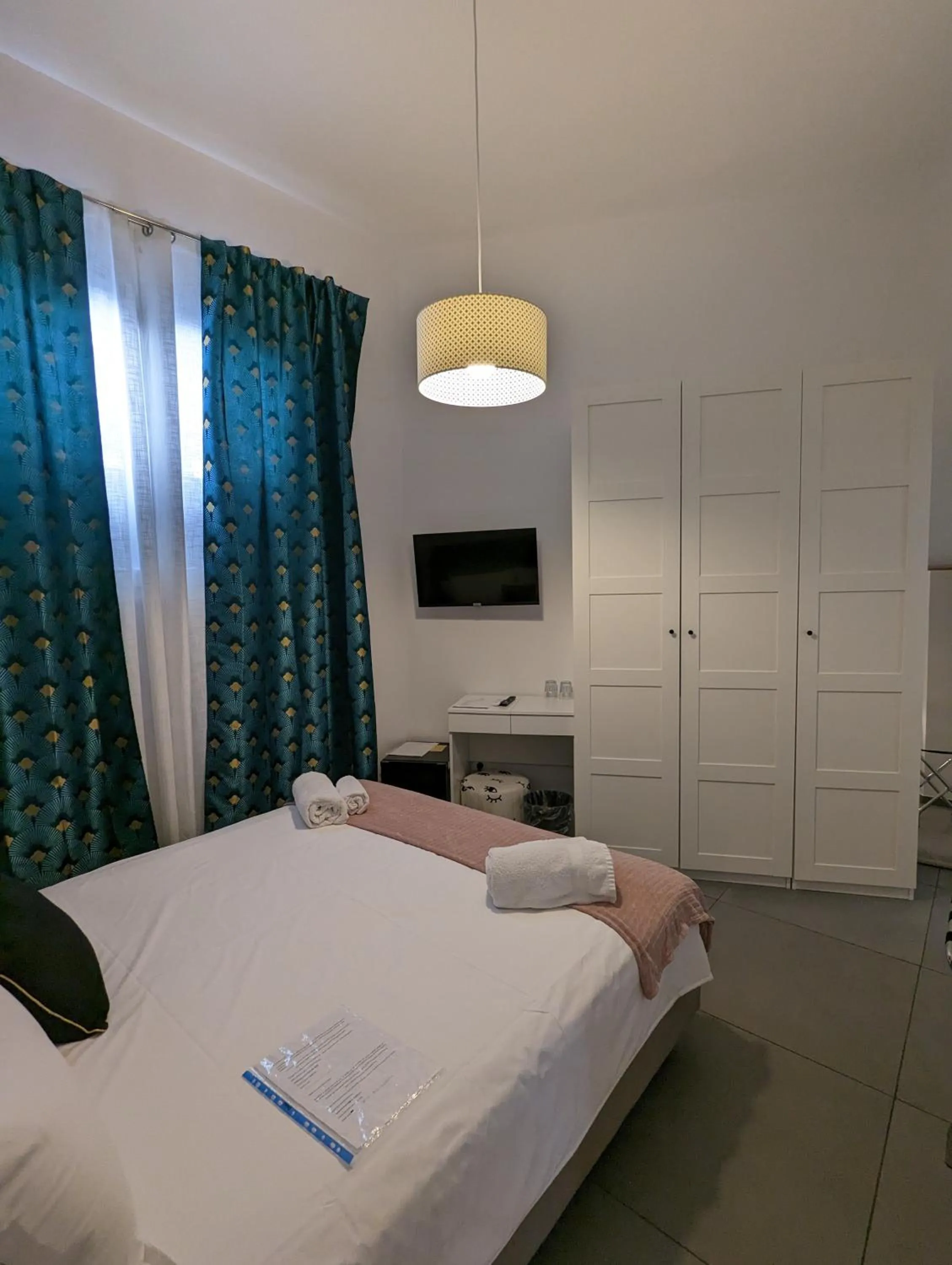 Bed in Zefiro Suites