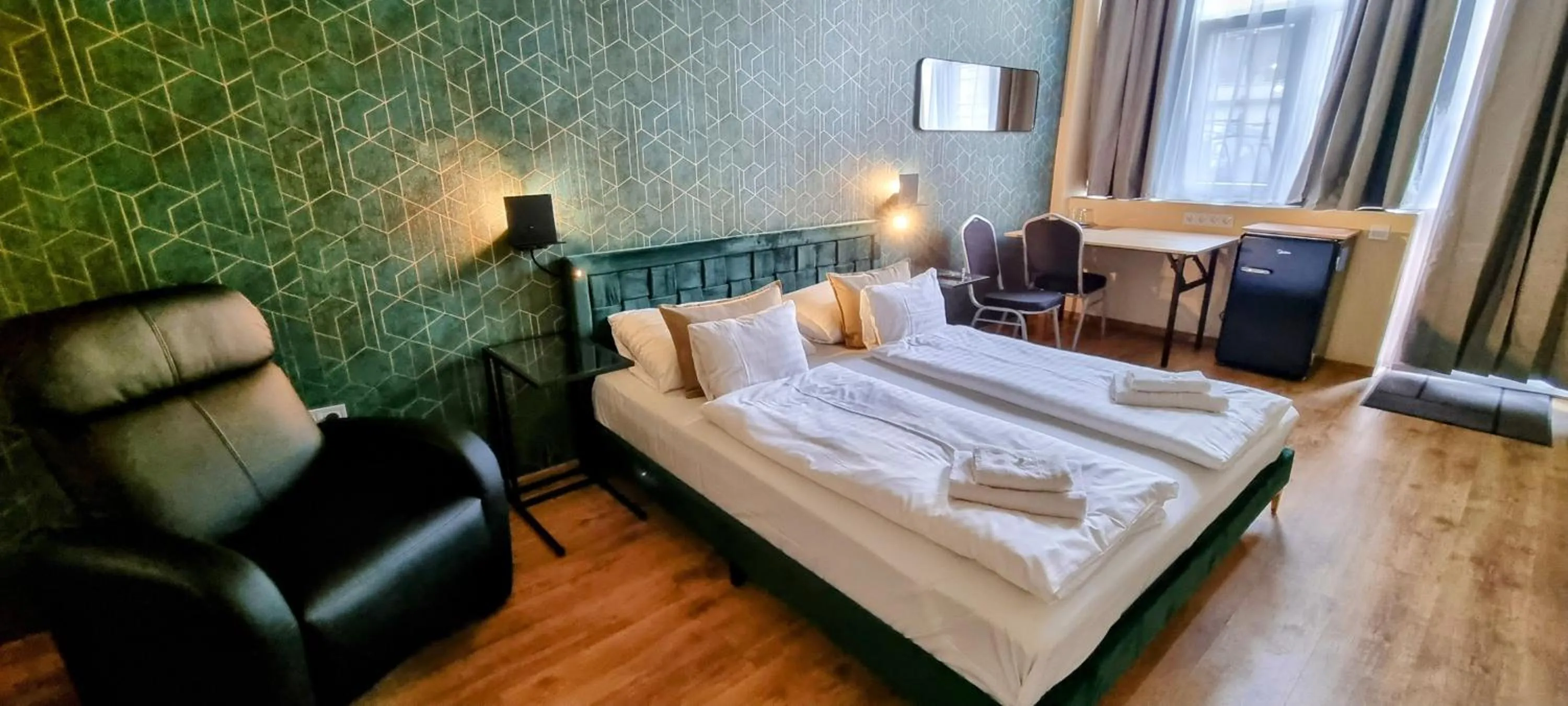 Bed in Boutique Hotel & Event Center