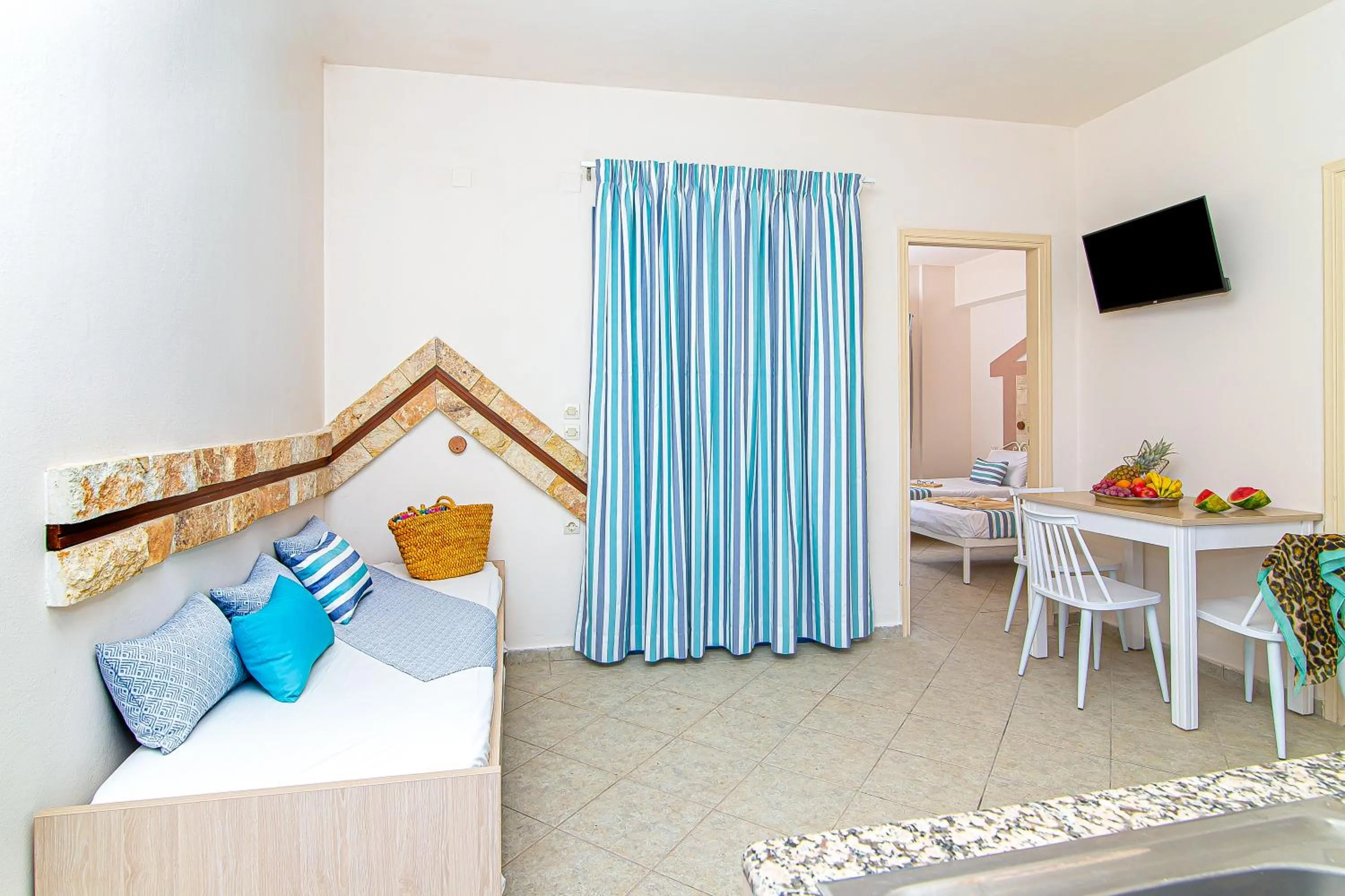 Living room, Bed in Ilios Malia Hotel Resort