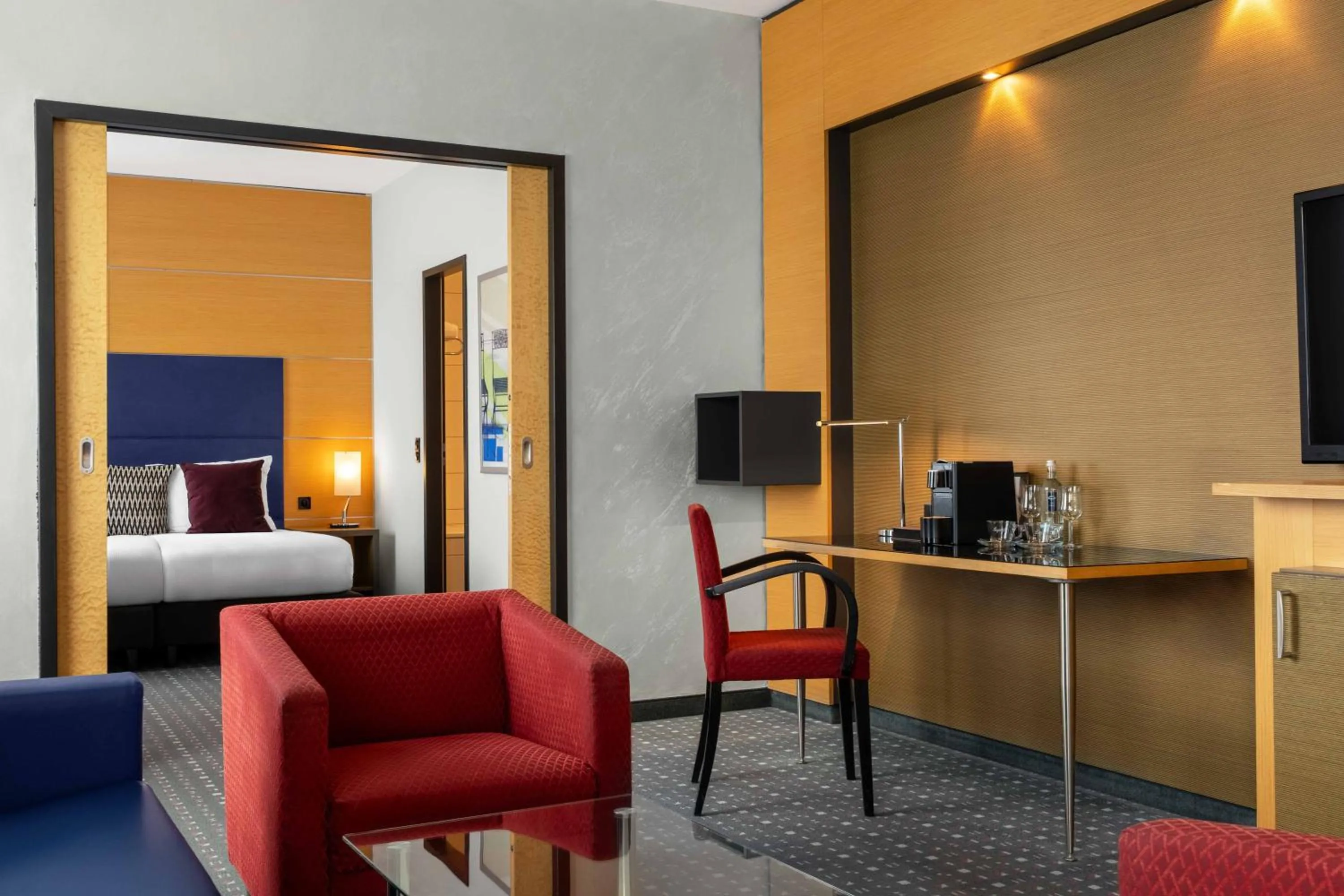 Seating area, Bed in Ramada by Wyndham Essen