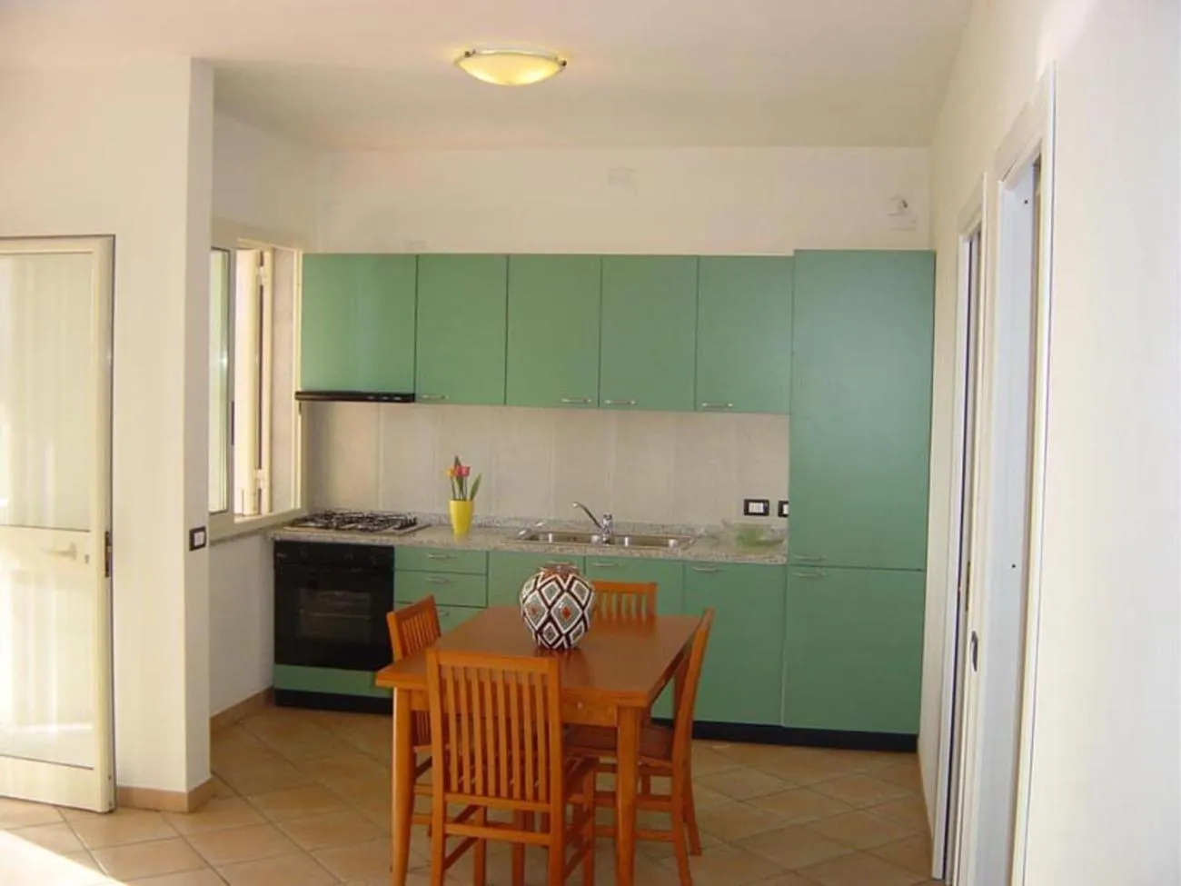 Kitchen or kitchenette in Residence la Chimera