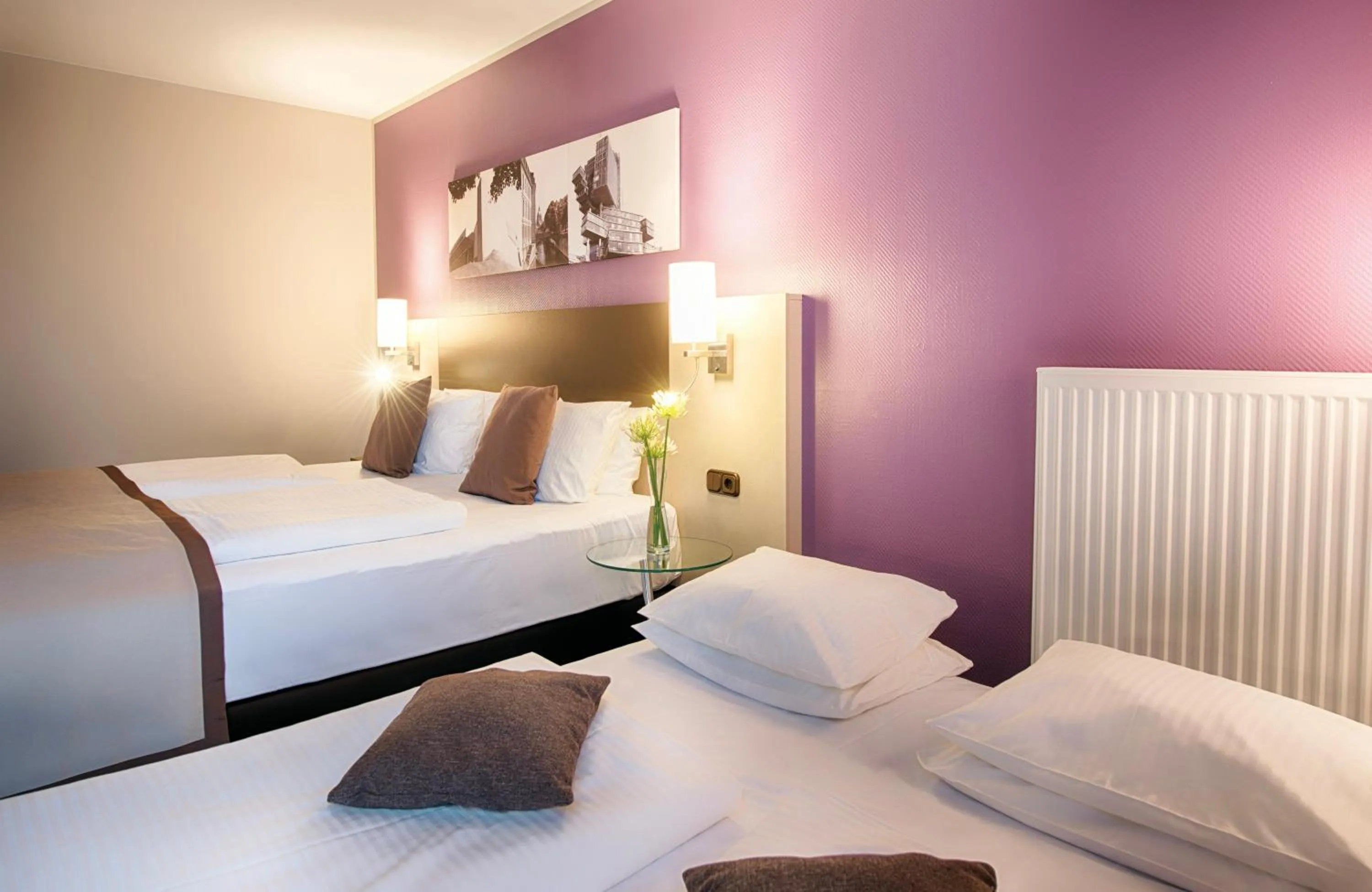 Photo of the whole room, Bed in Leonardo Hotel Hannover Airport