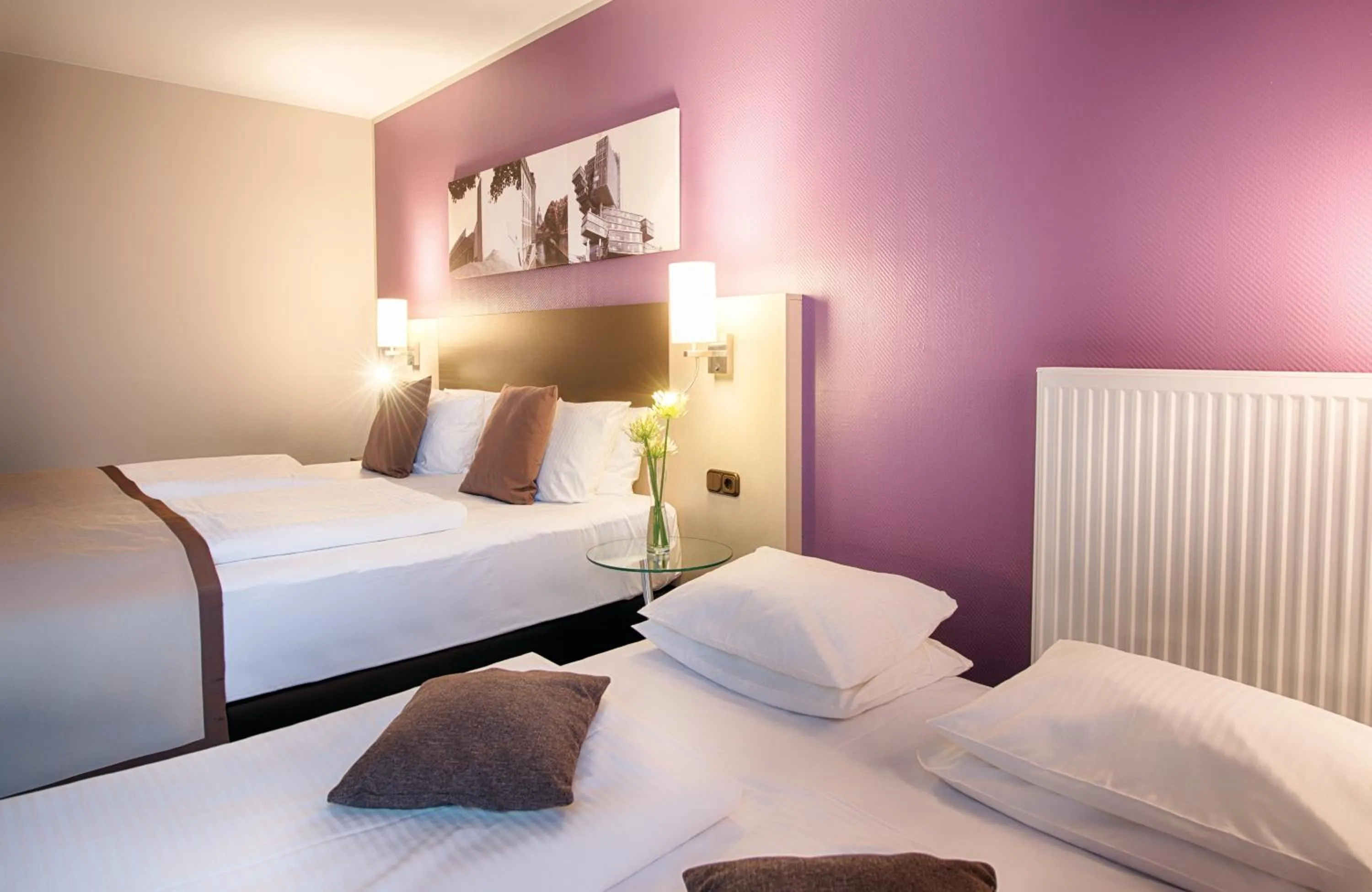 Photo of the whole room, Bed in Leonardo Hotel Hannover Airport