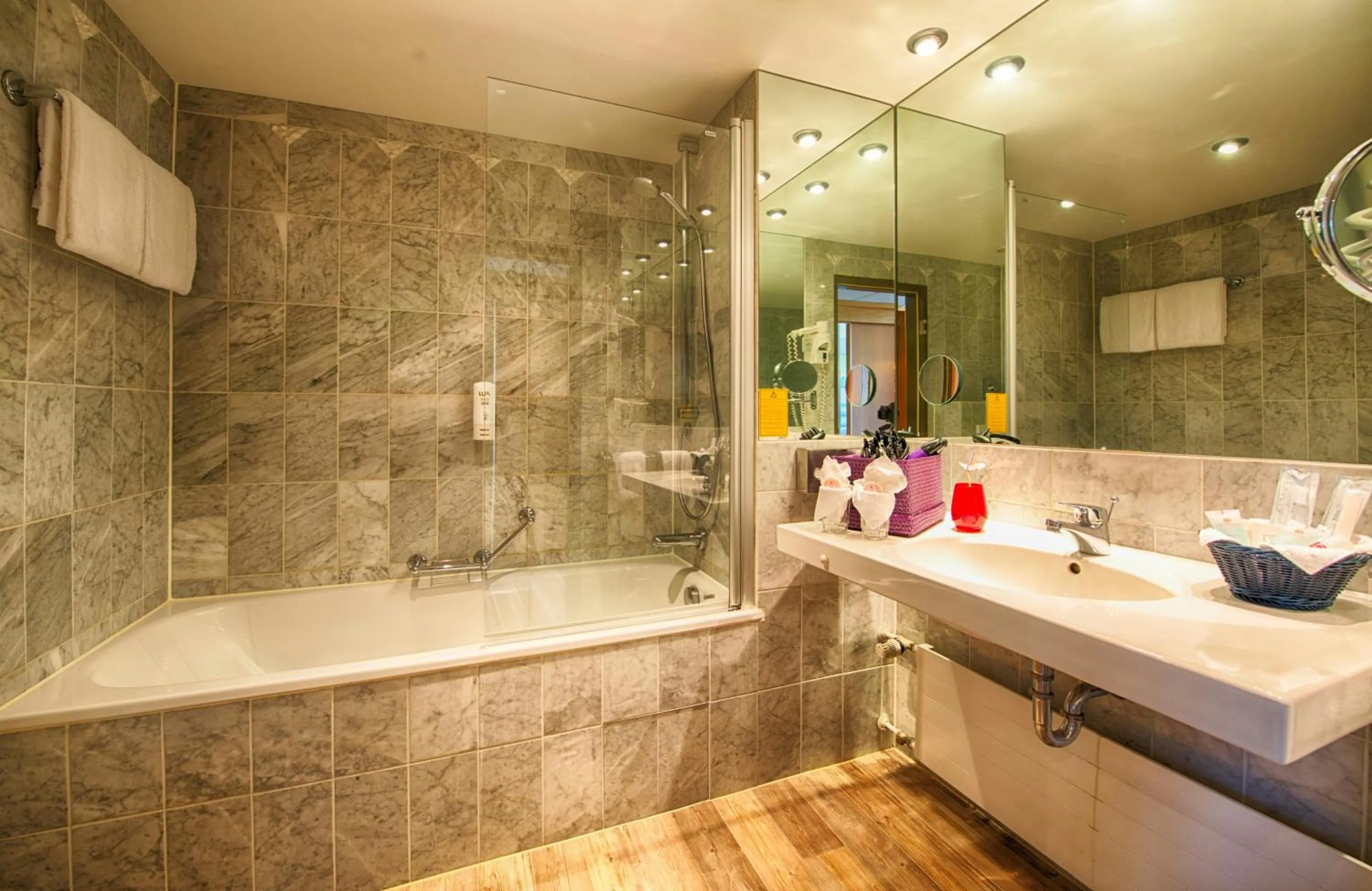 Bathroom in Leonardo Royal Hotel Köln - Am Stadtwald