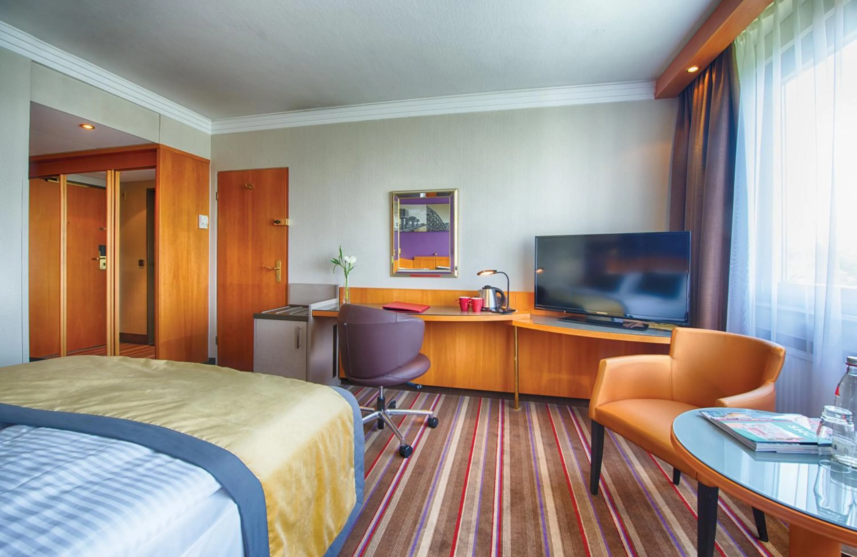 Photo of the whole room, Bed in Leonardo Royal Hotel Köln - Am Stadtwald