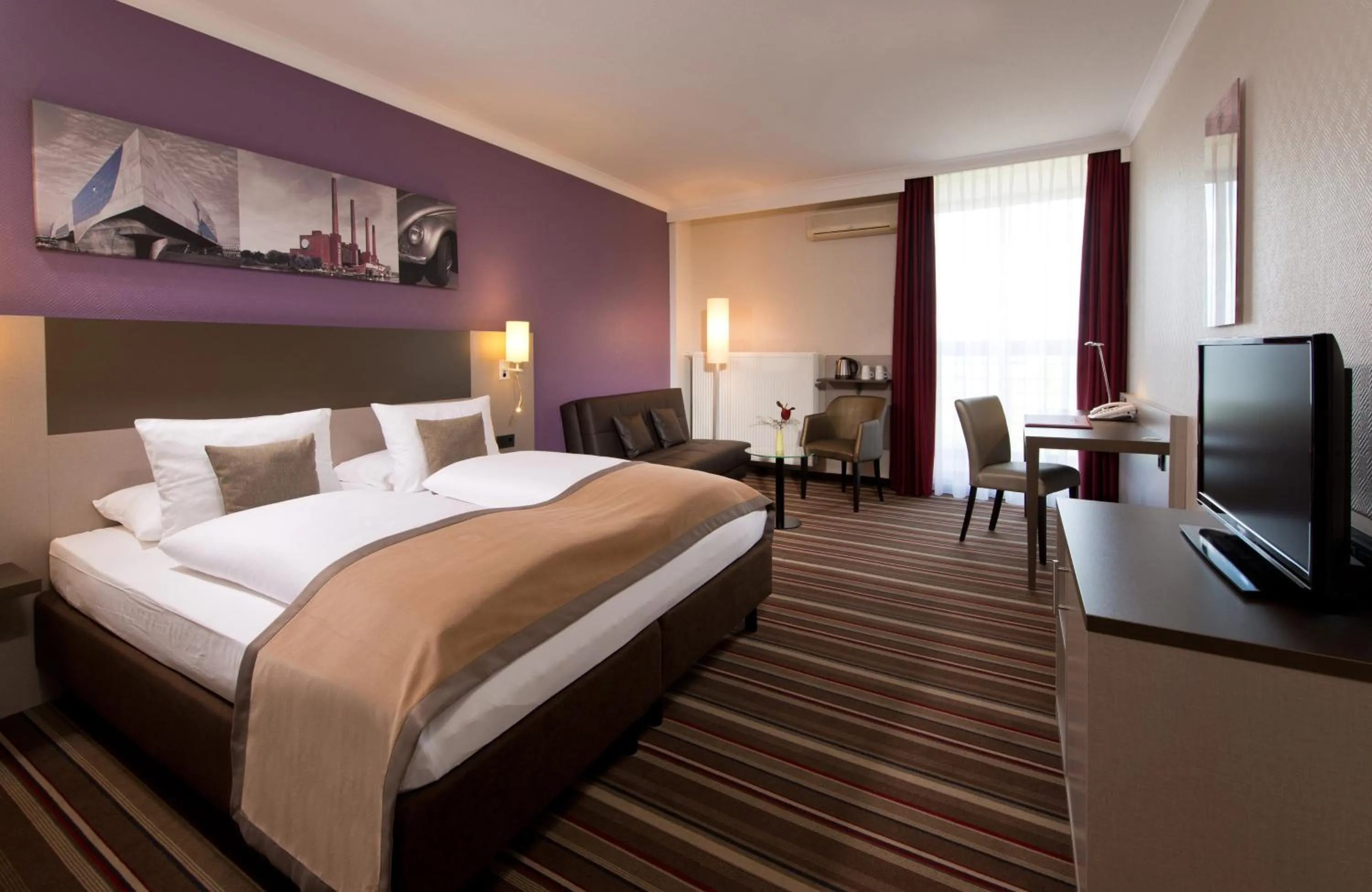 Photo of the whole room, Bed in Leonardo Hotel Wolfsburg City Center