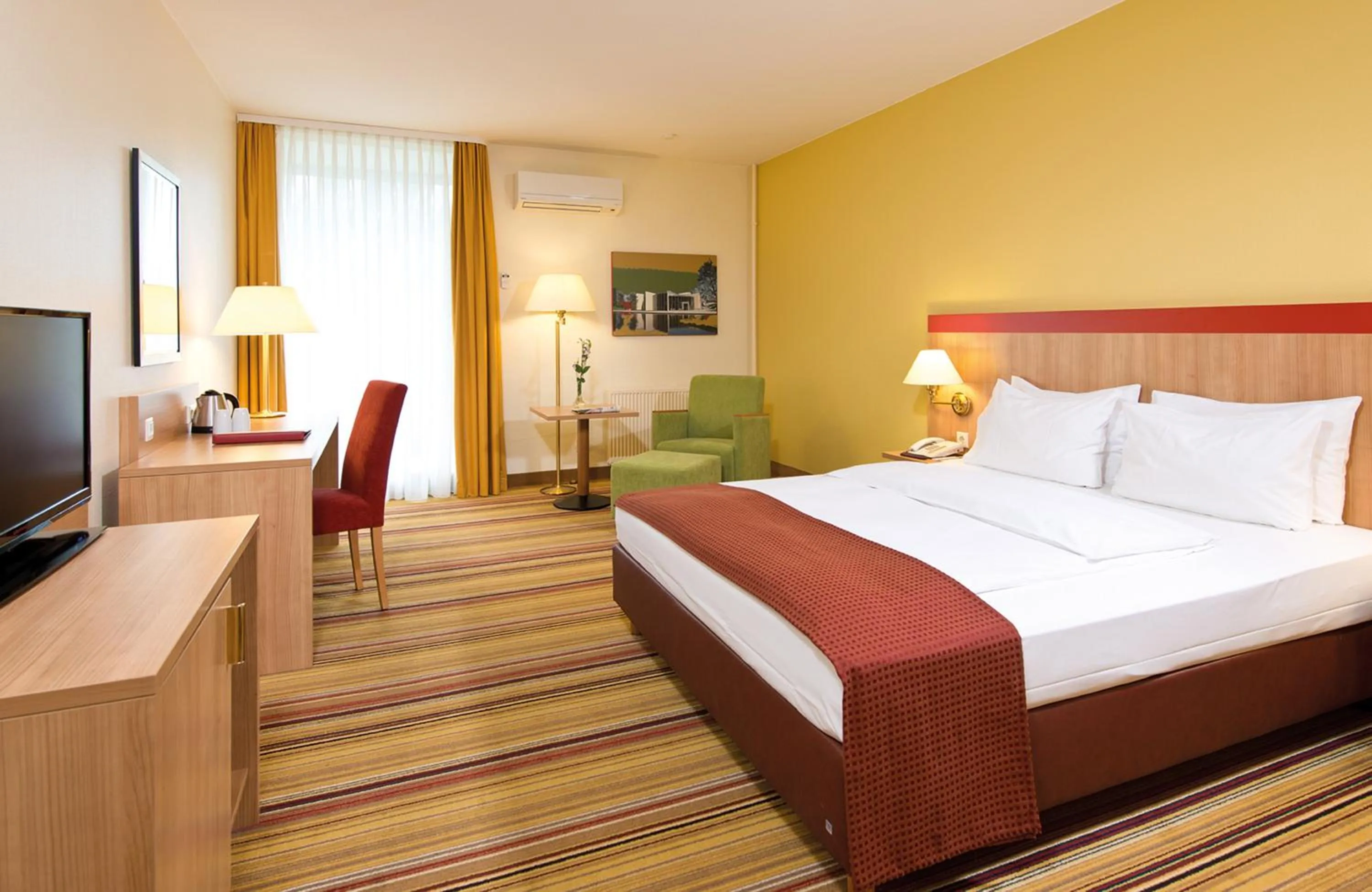 Photo of the whole room, Bed in Leonardo Hotel Wolfsburg City Center