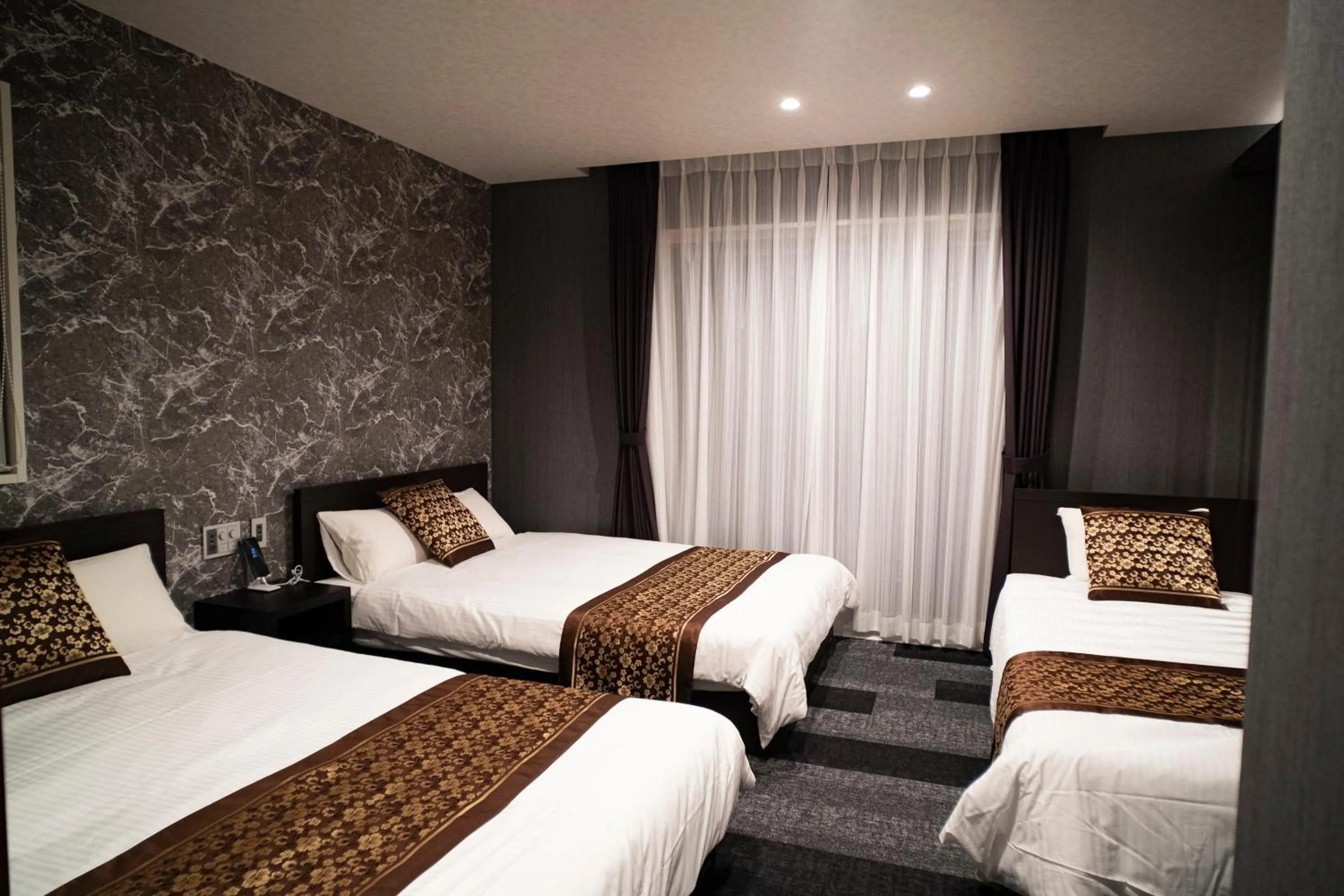 Bed in GRAND BASE Mojiko Ekimae