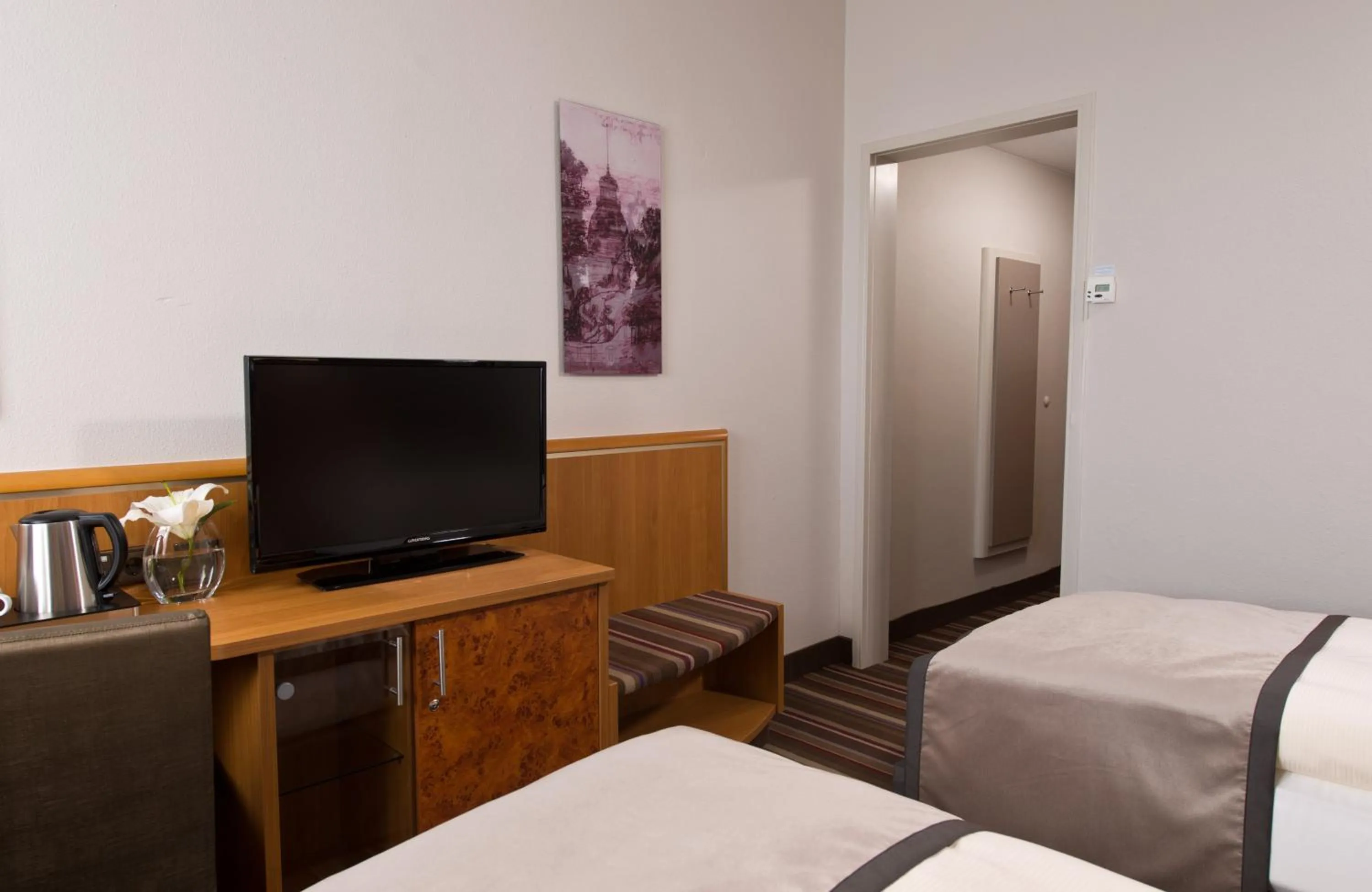 Photo of the whole room, Bed in Leonardo Hotel Karlsruhe