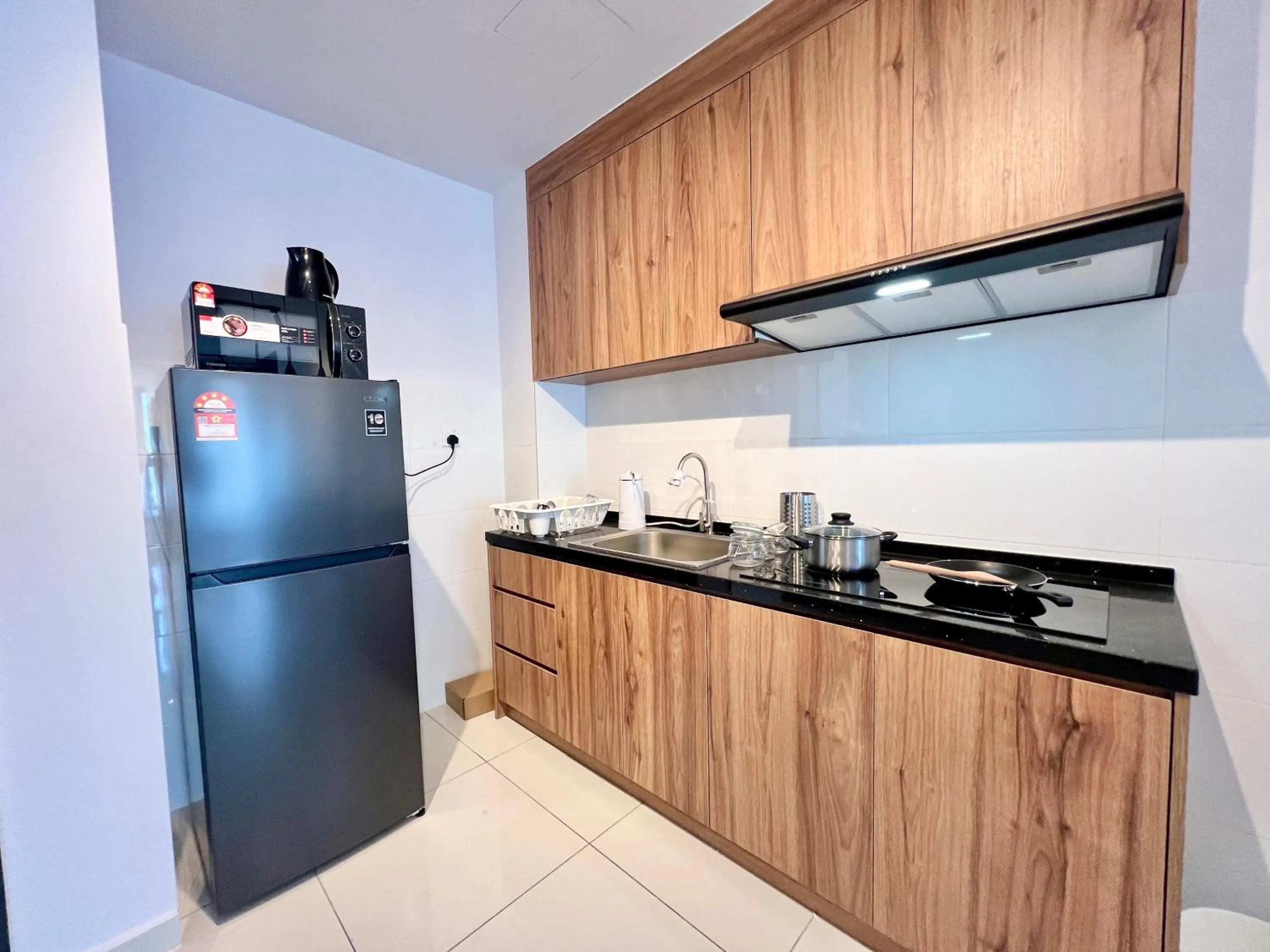 Kitchen or kitchenette in Gaia Residence, Gamuda Gardens Rawang by Sleepy Bear