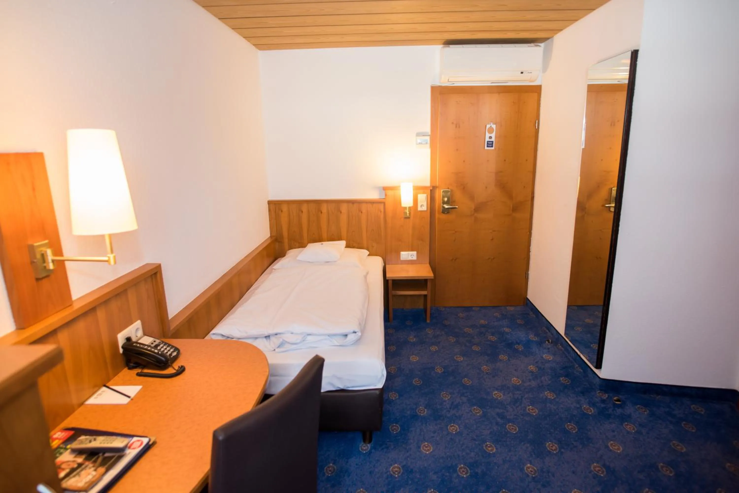 Photo of the whole room, Bed in Hotel Stuttgart 21
