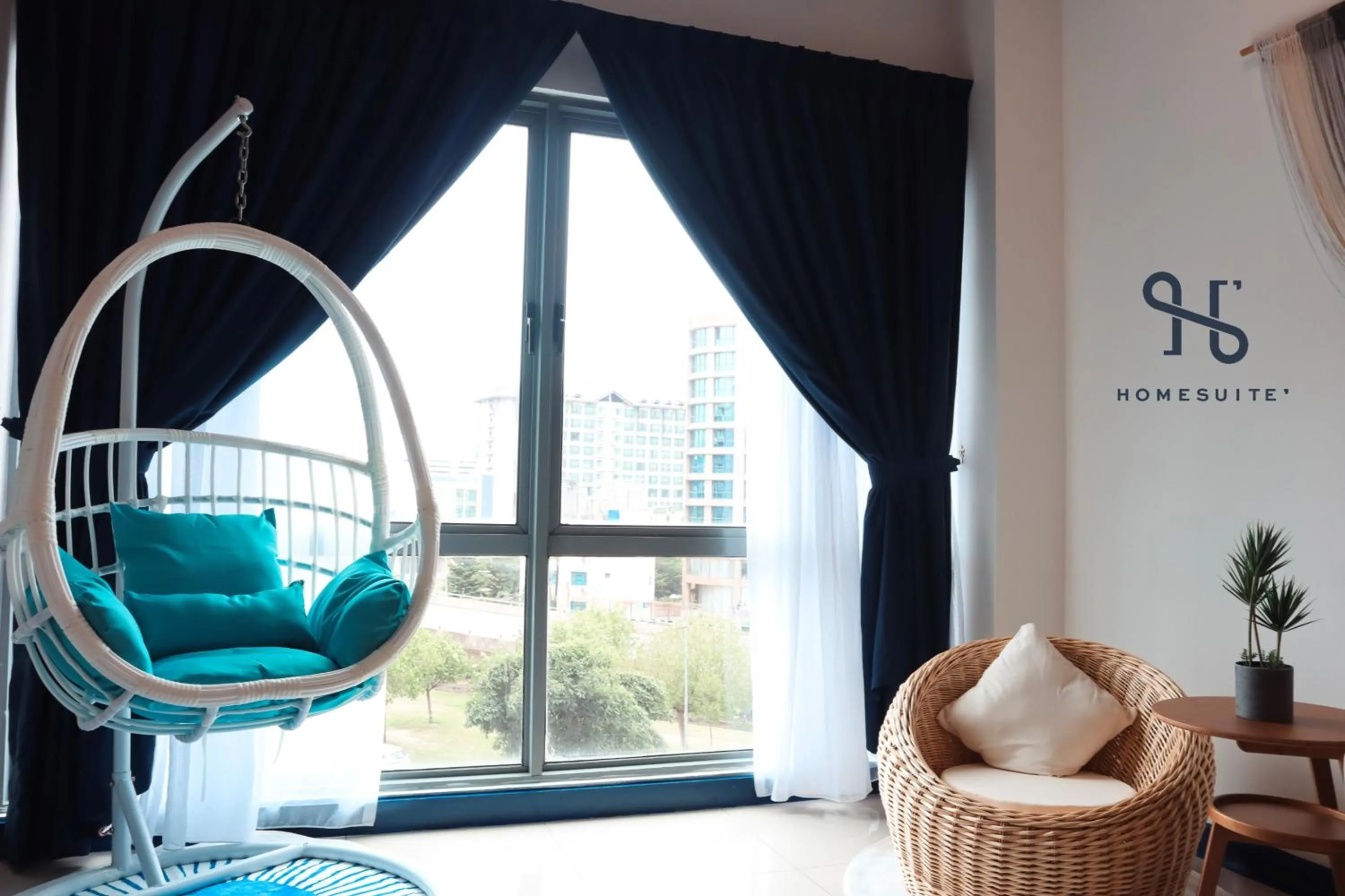 Living room, Bed in Homesuite' Home at The Loft