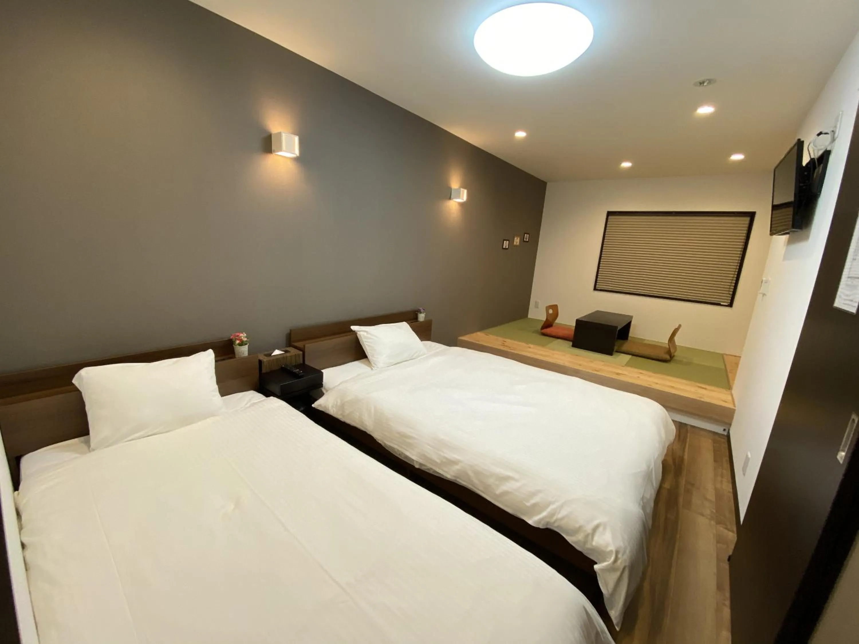 Bed in KYOTO STATION HOUSE