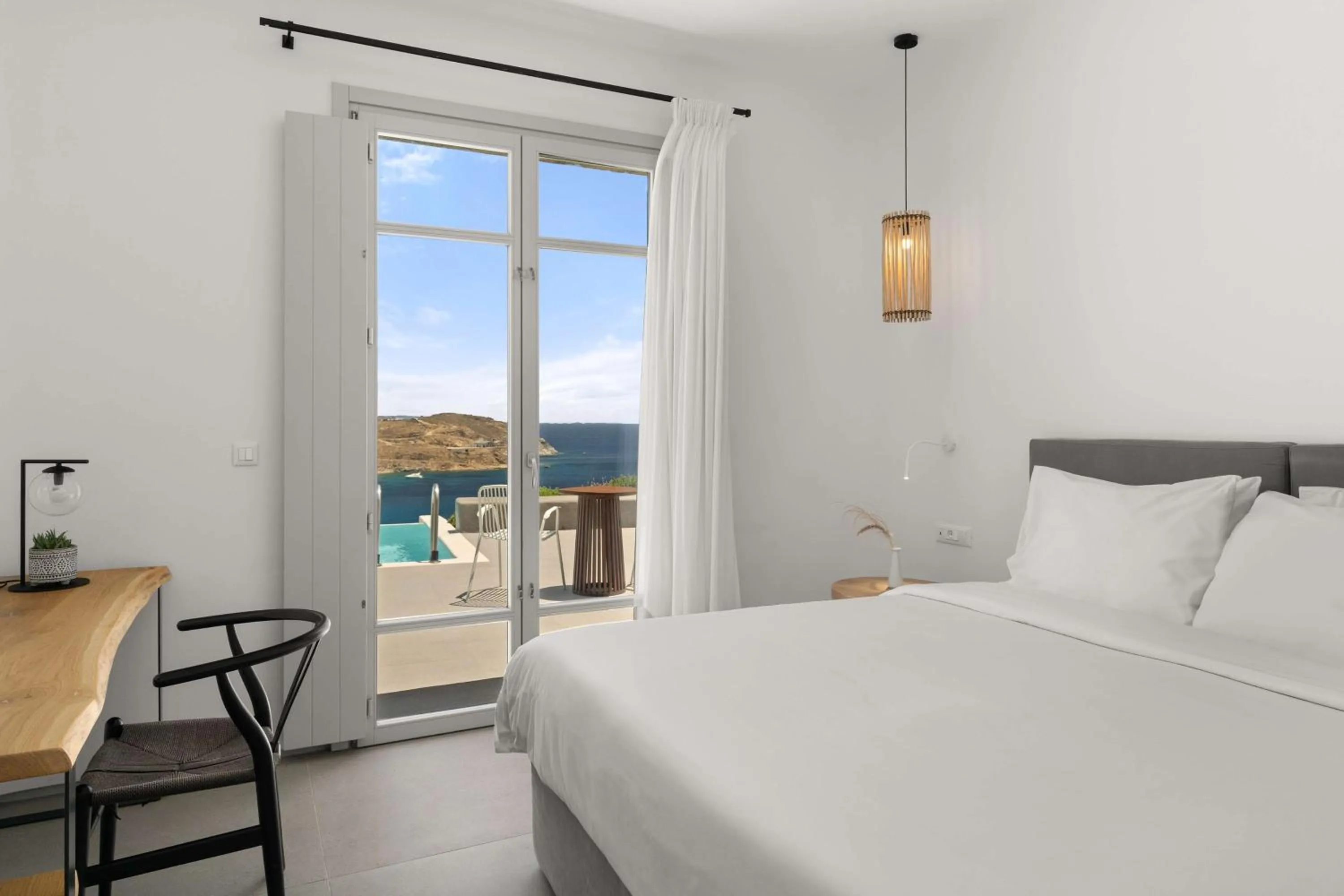 Photo of the whole room, Bed in Radisson Blu Euphoria Resort, Mykonos
