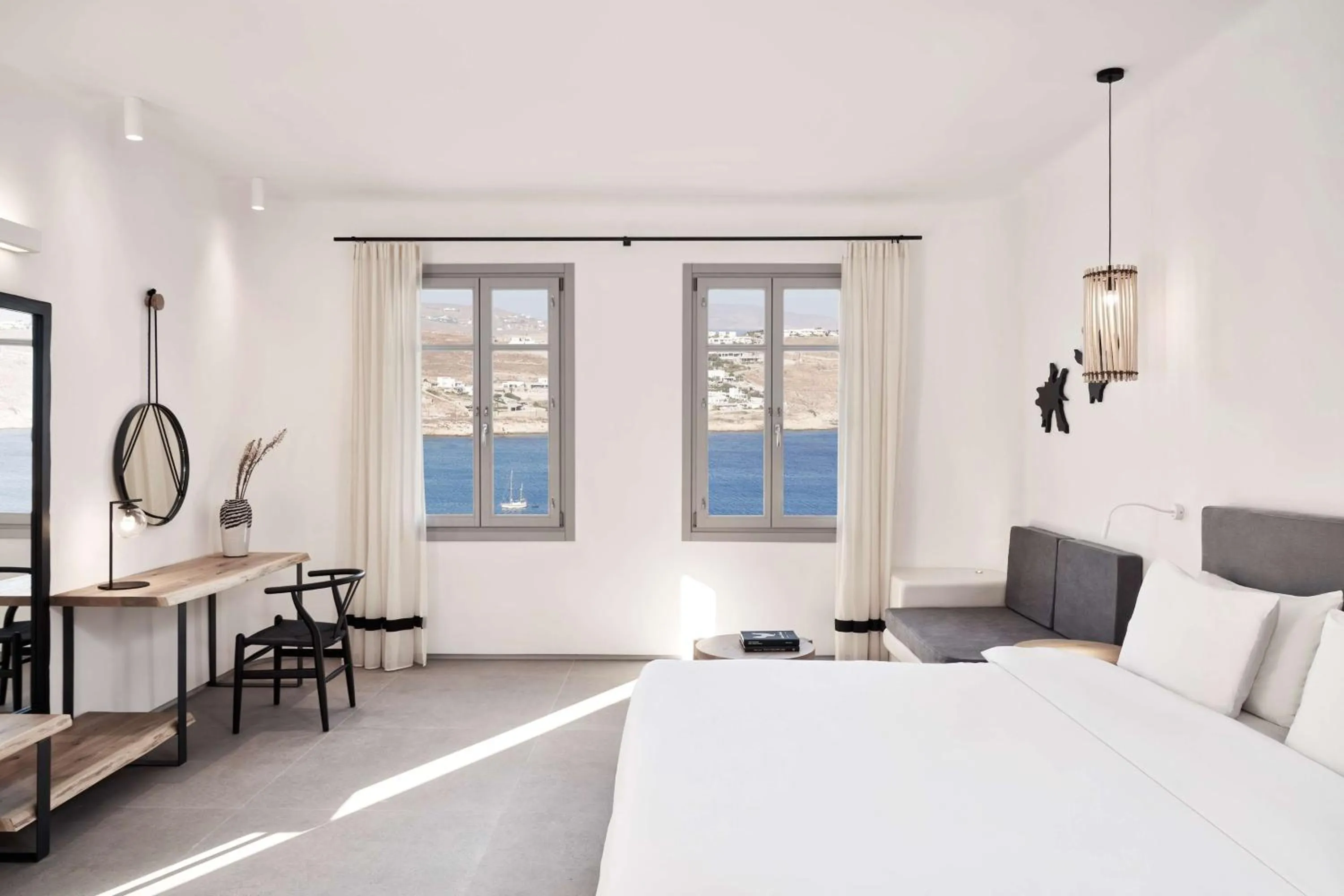 Photo of the whole room, Bed in Radisson Blu Euphoria Resort, Mykonos