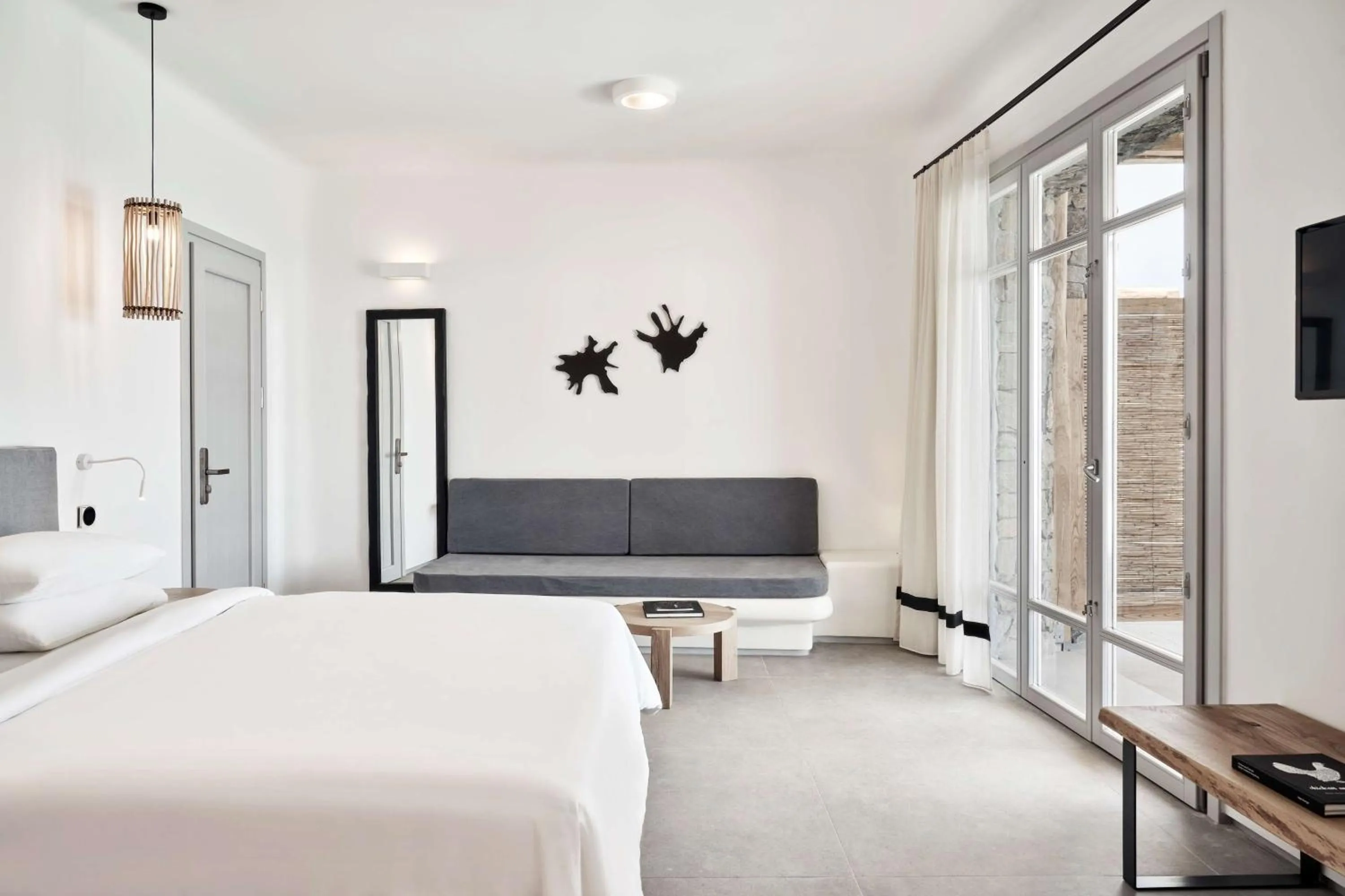 Photo of the whole room, Bed in Radisson Blu Euphoria Resort, Mykonos