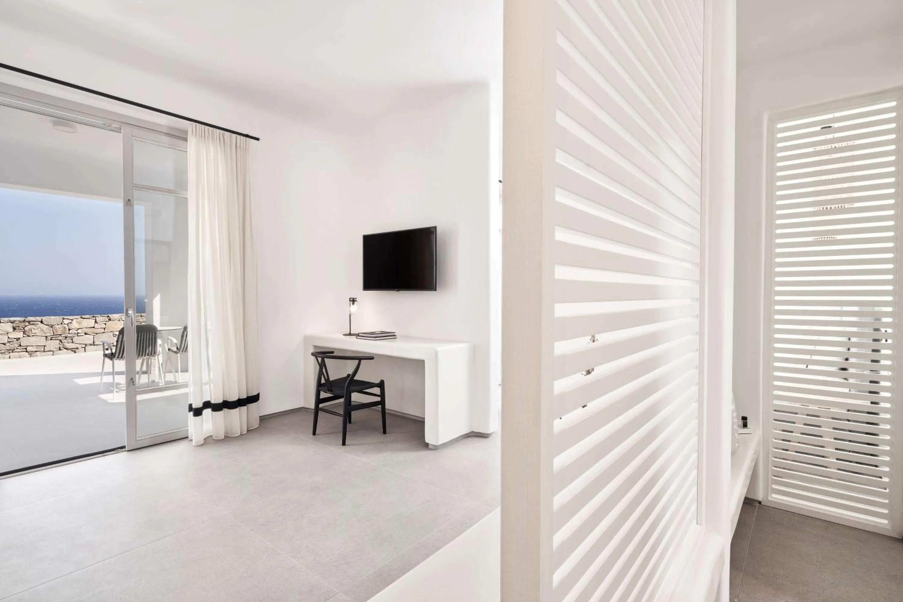 Photo of the whole room, Bed in Radisson Blu Euphoria Resort, Mykonos