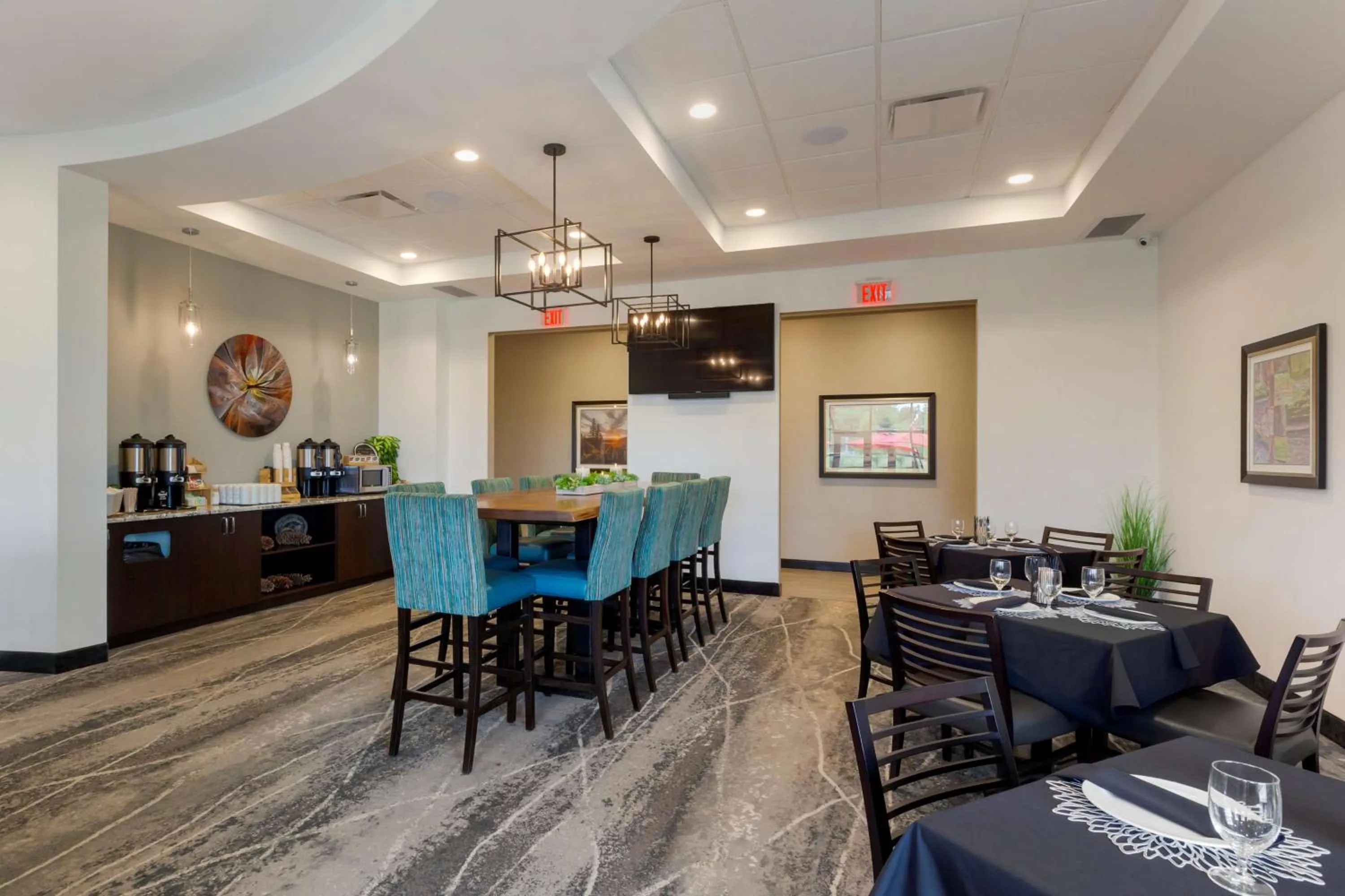 Communal lounge/ TV room in Best Western Premier Northwood Hotel