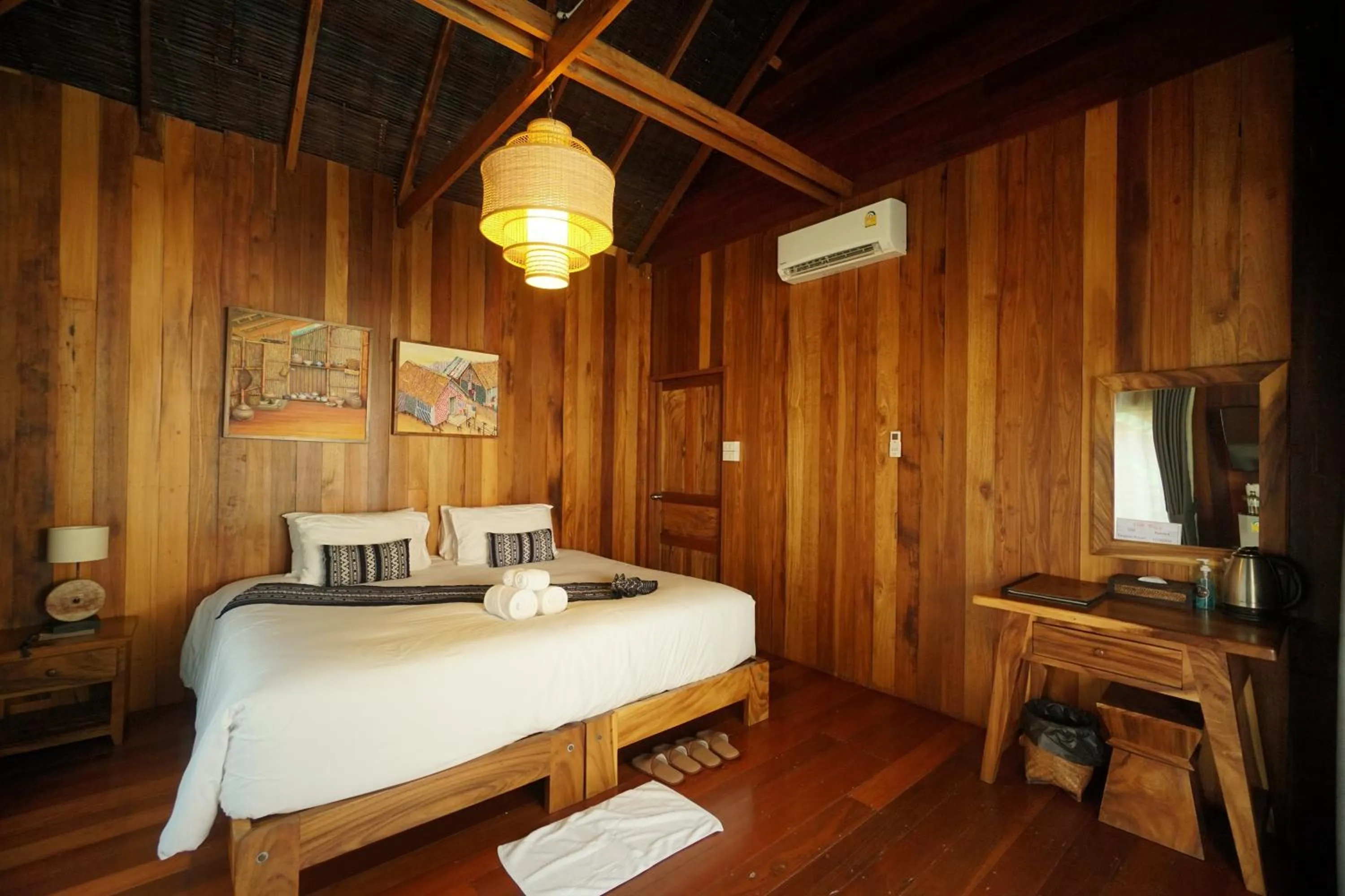 Bed in Tongna Cottage Natural Resort