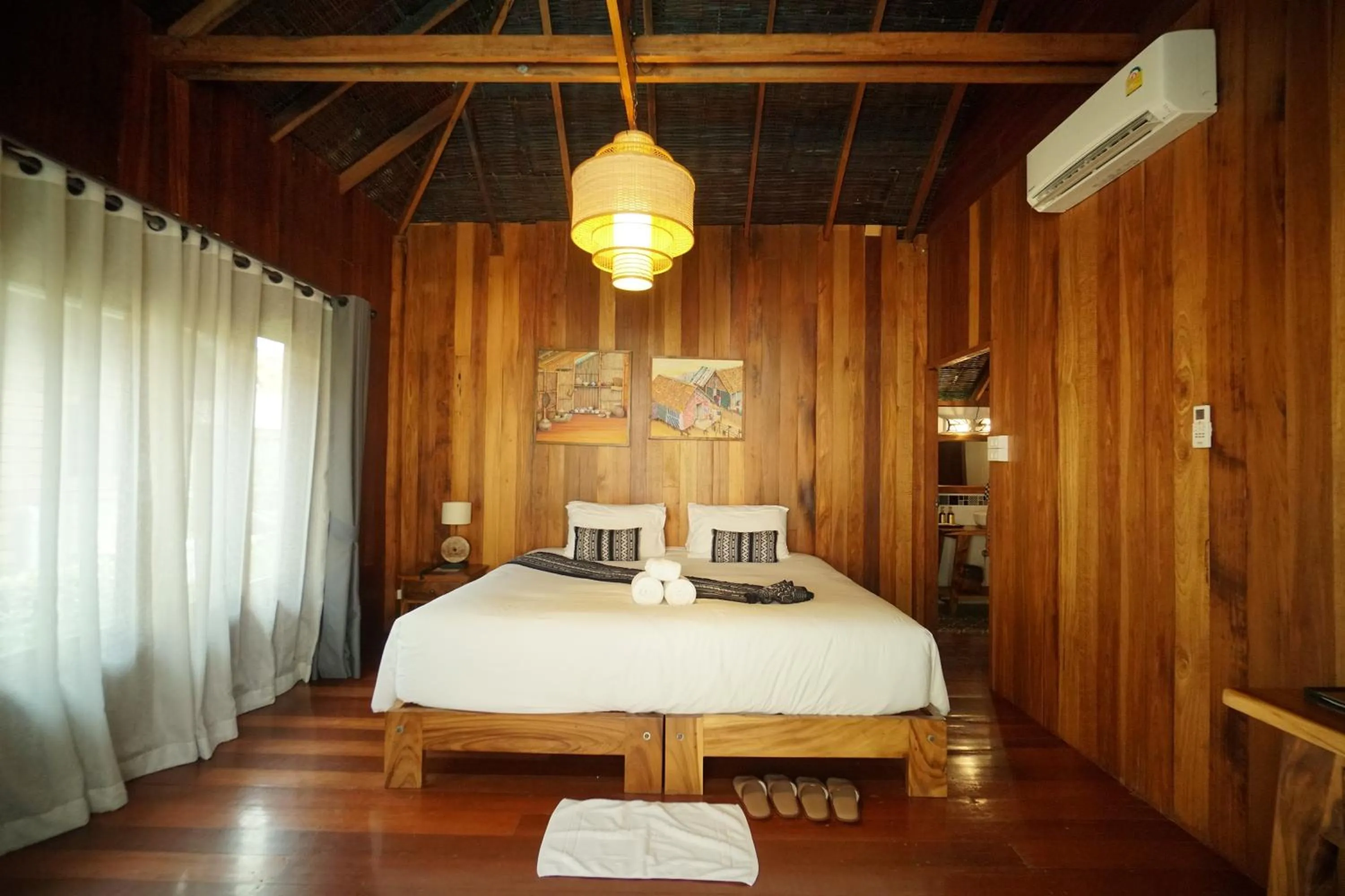 Bed in Tongna Cottage Natural Resort