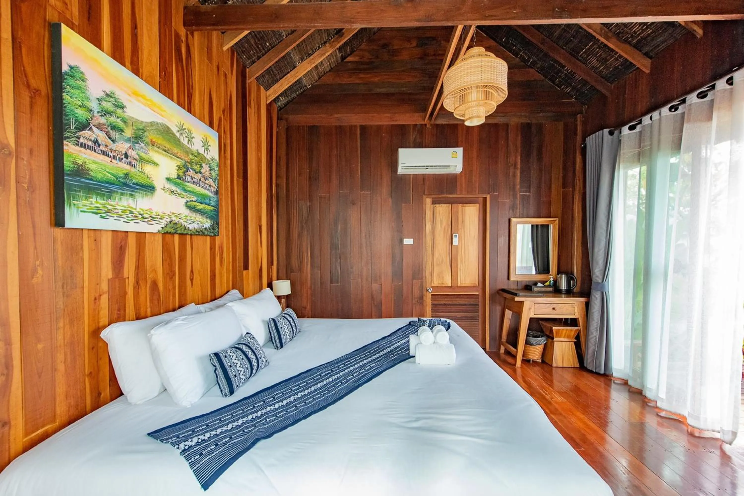 Bed in Tongna Cottage Natural Resort