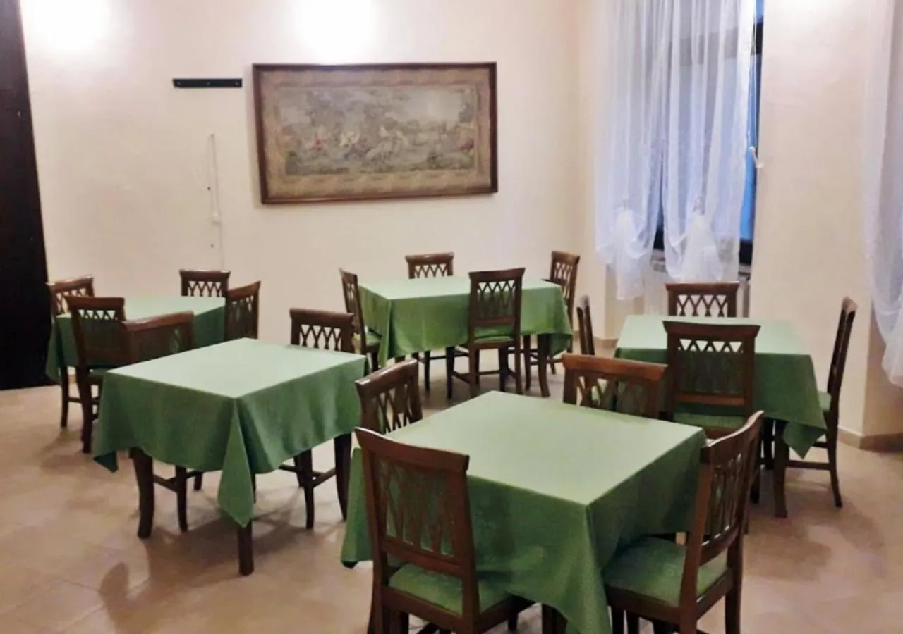 Communal lounge/ TV room in B&B Valle Florina