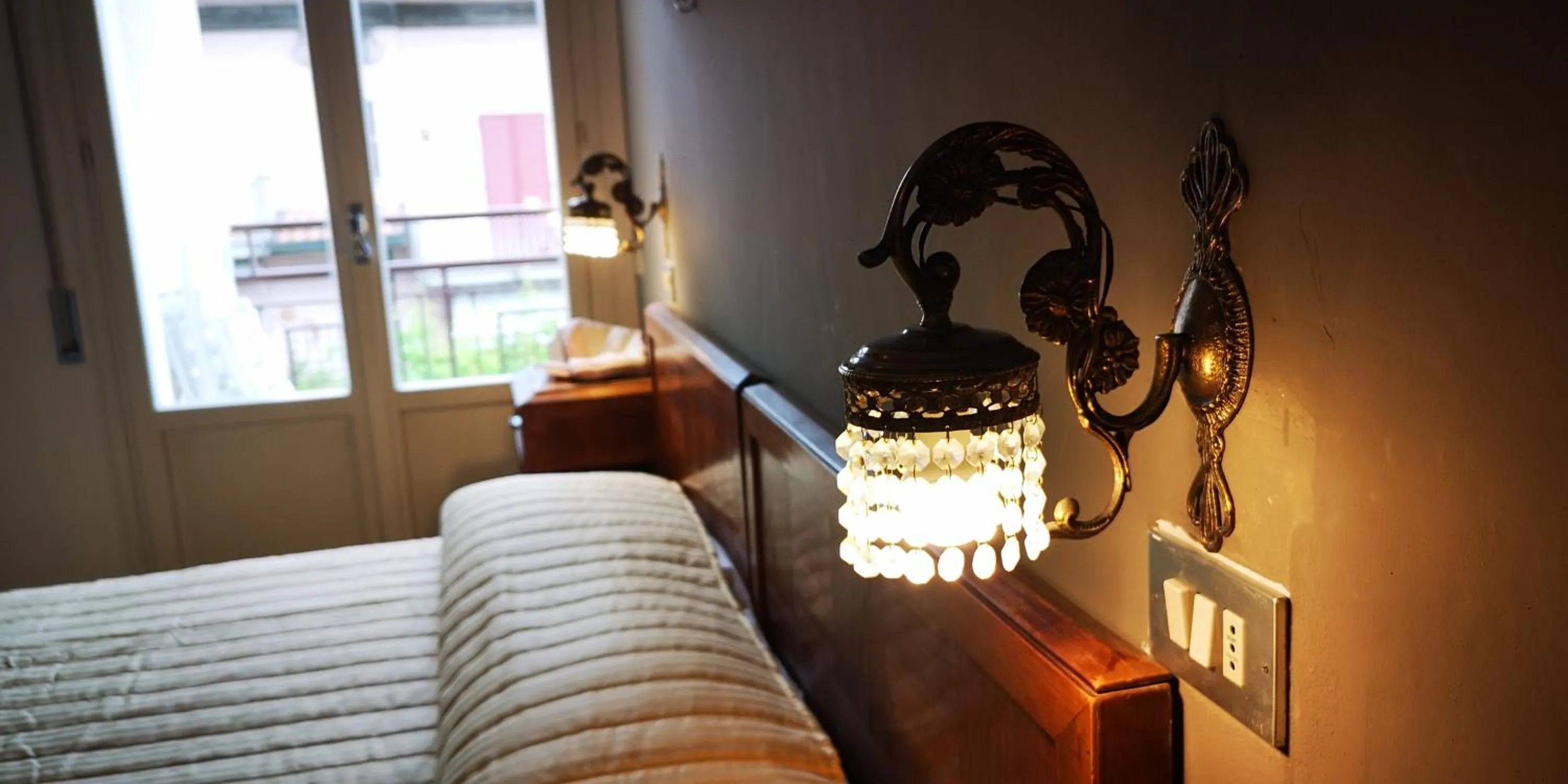 Decorative detail, Bed in VILLA ANTONIETTA Rooms & Coffee