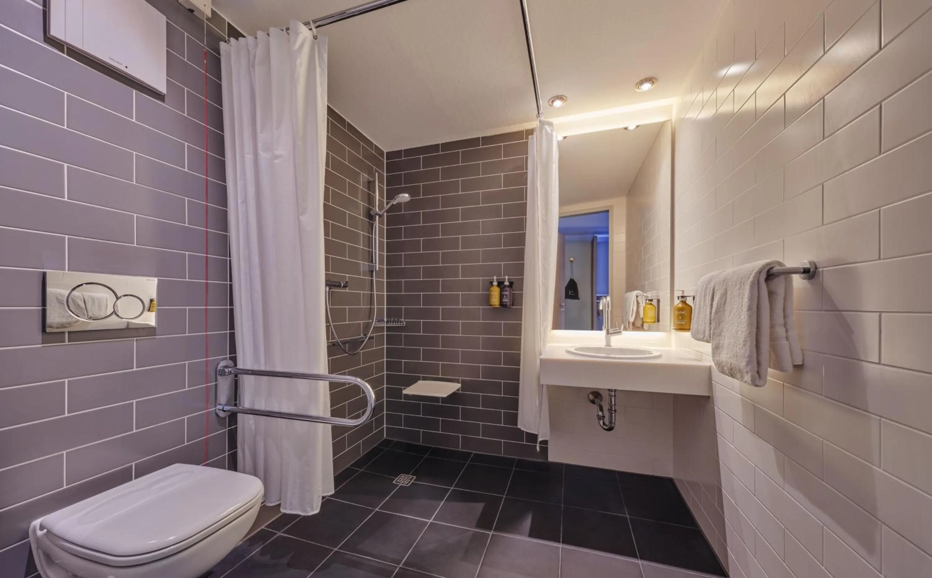 Bathroom in Holiday Inn Express Frankfurt Messe by IHG