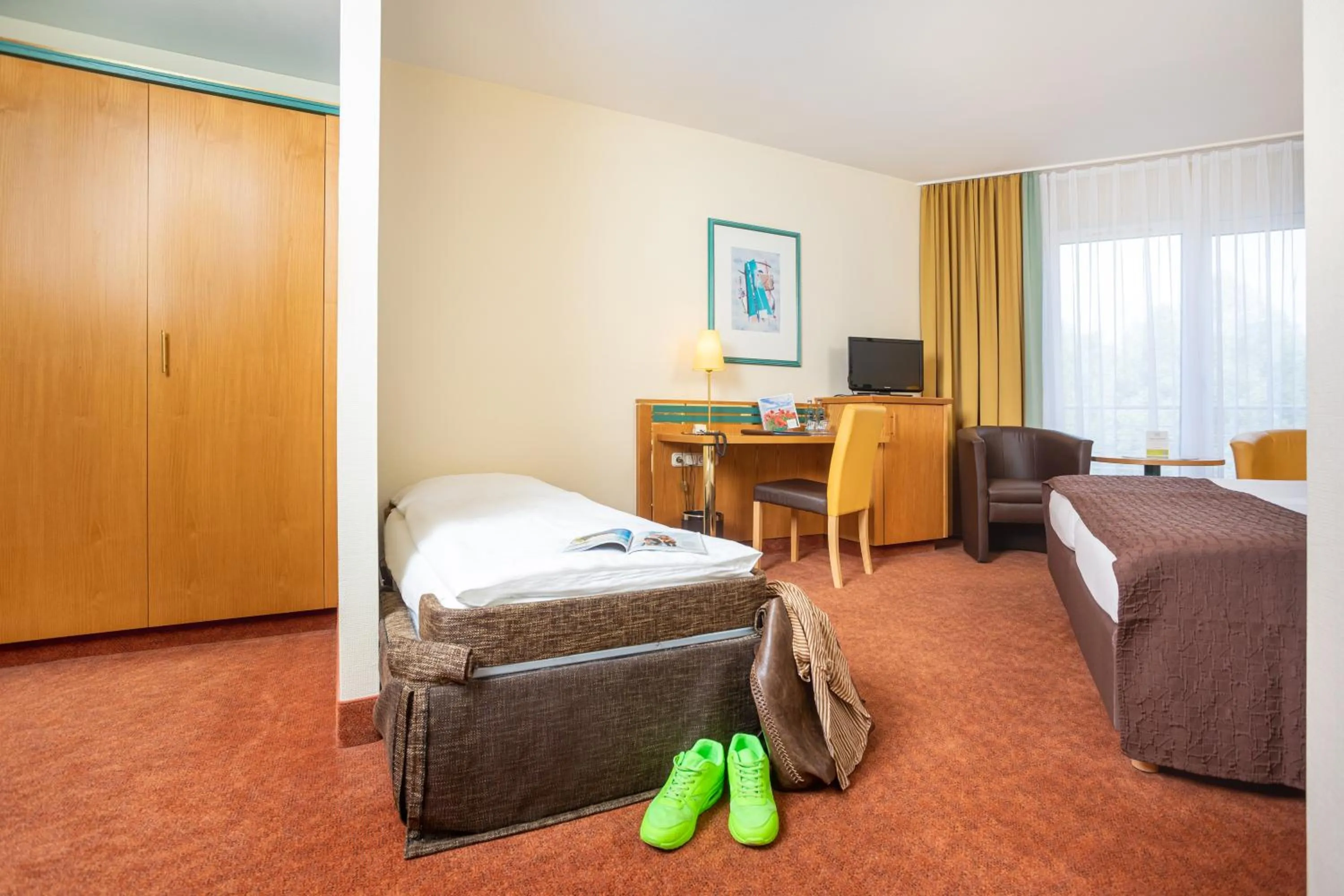 Photo of the whole room, Bed in Parkhotel Rügen