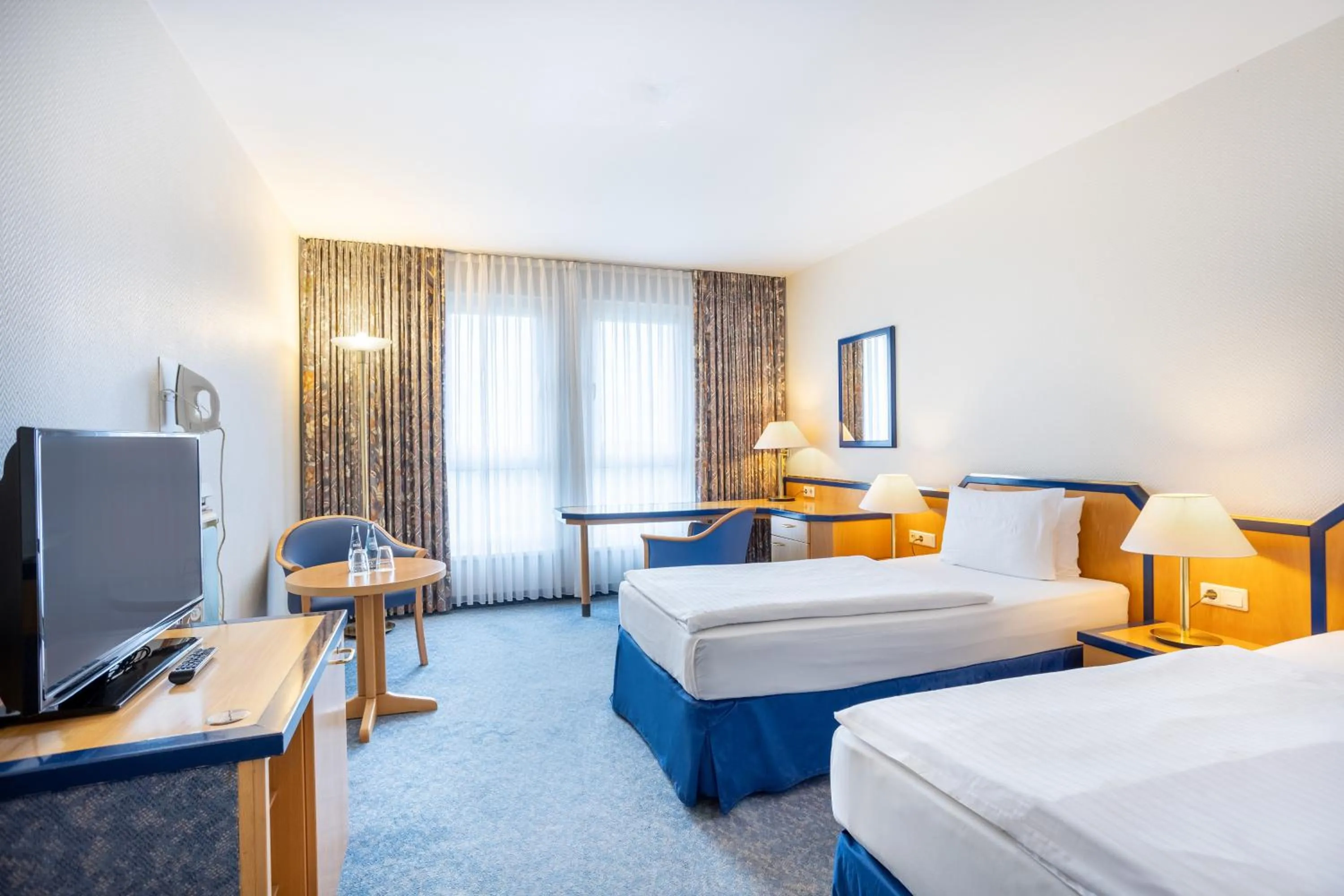 Bed in Holiday Inn Hamburg, an IHG Hotel