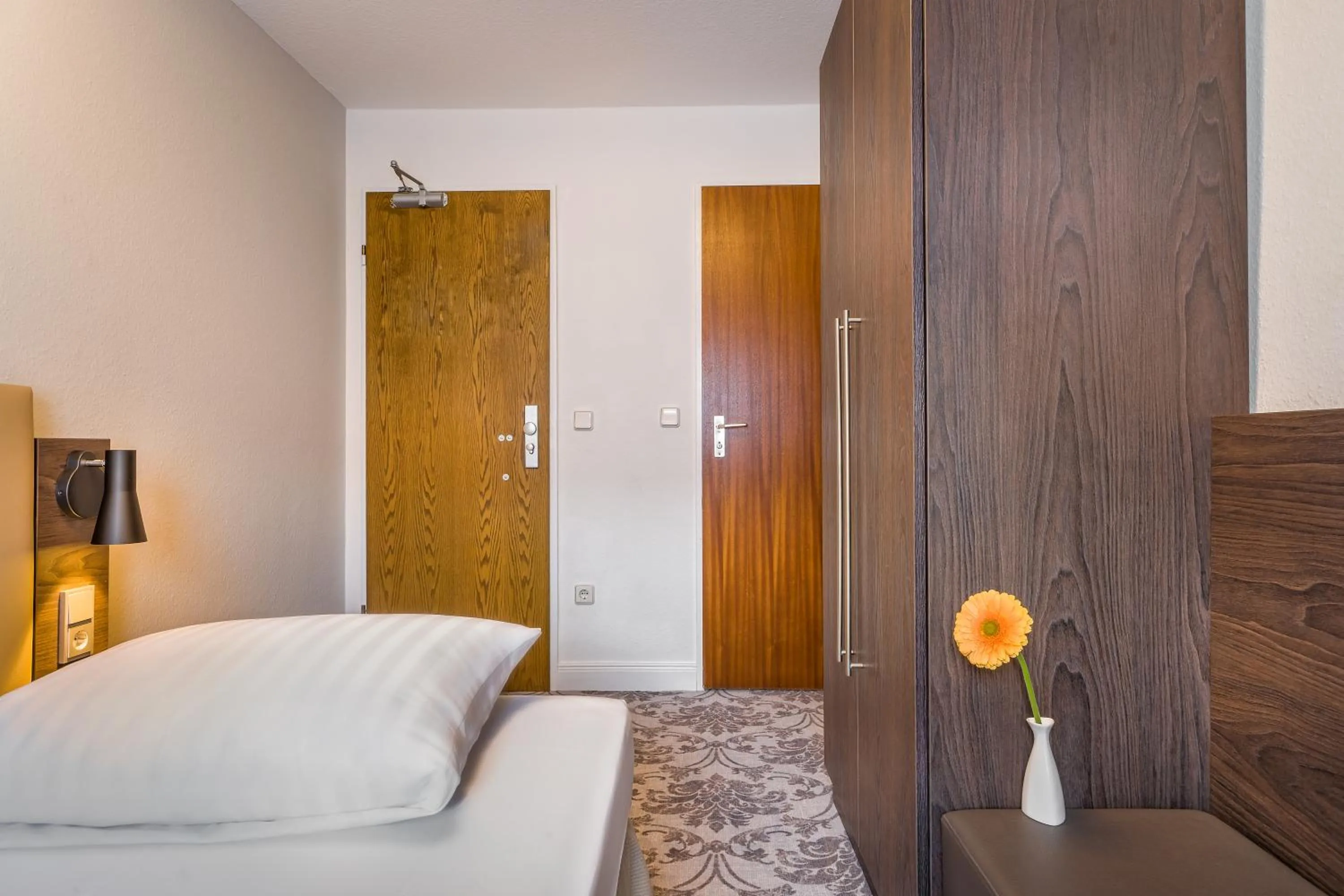 Photo of the whole room, Bed in Signature Hotel Astoria