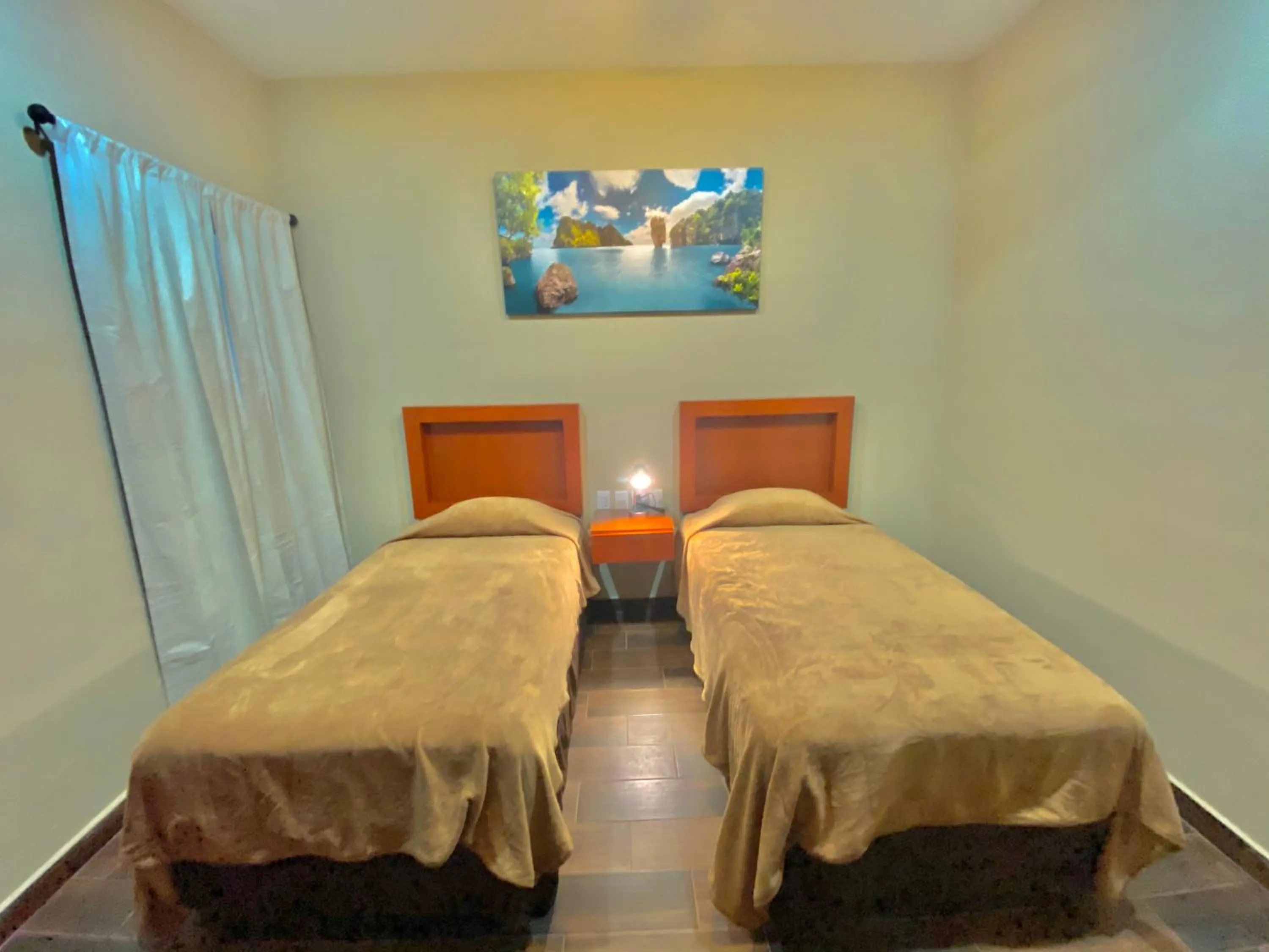 Bedroom, Bed in La Lola Hotel & Suites