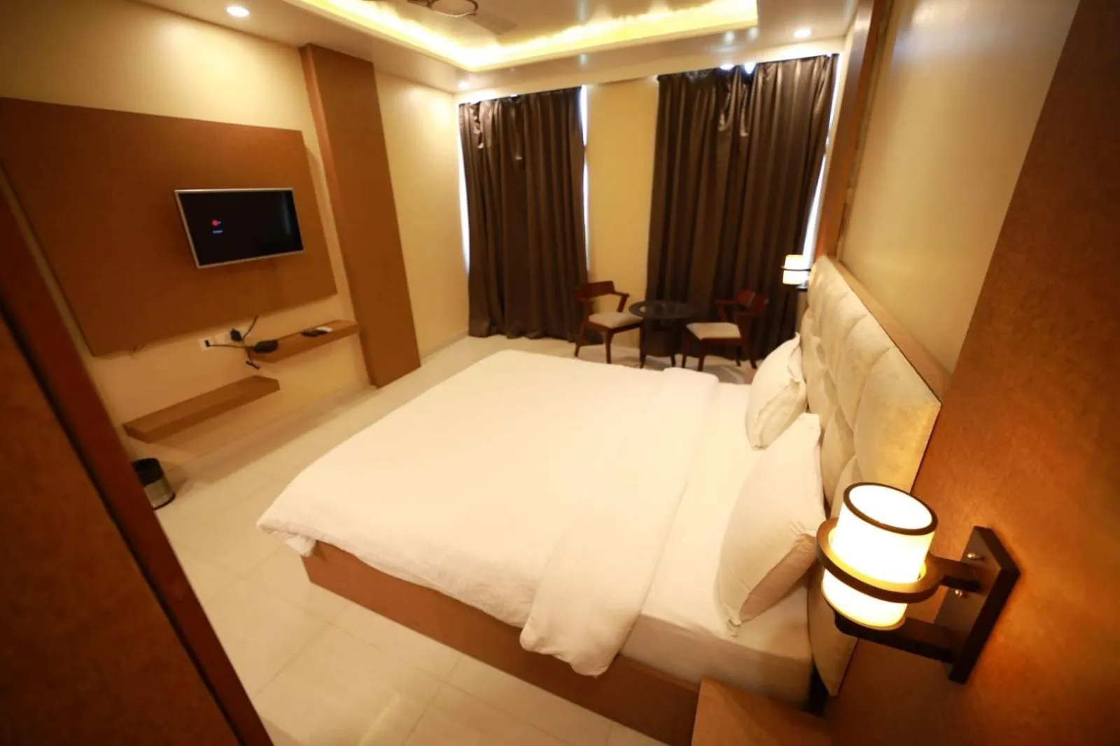 Photo of the whole room, Bed in Hotel Neerja Inn