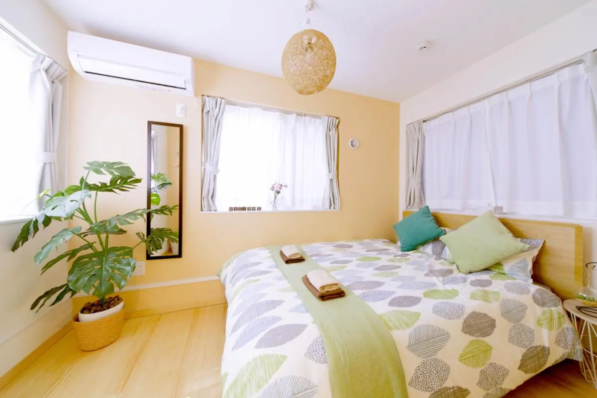 Bed in nestay villa tokyo otsuka