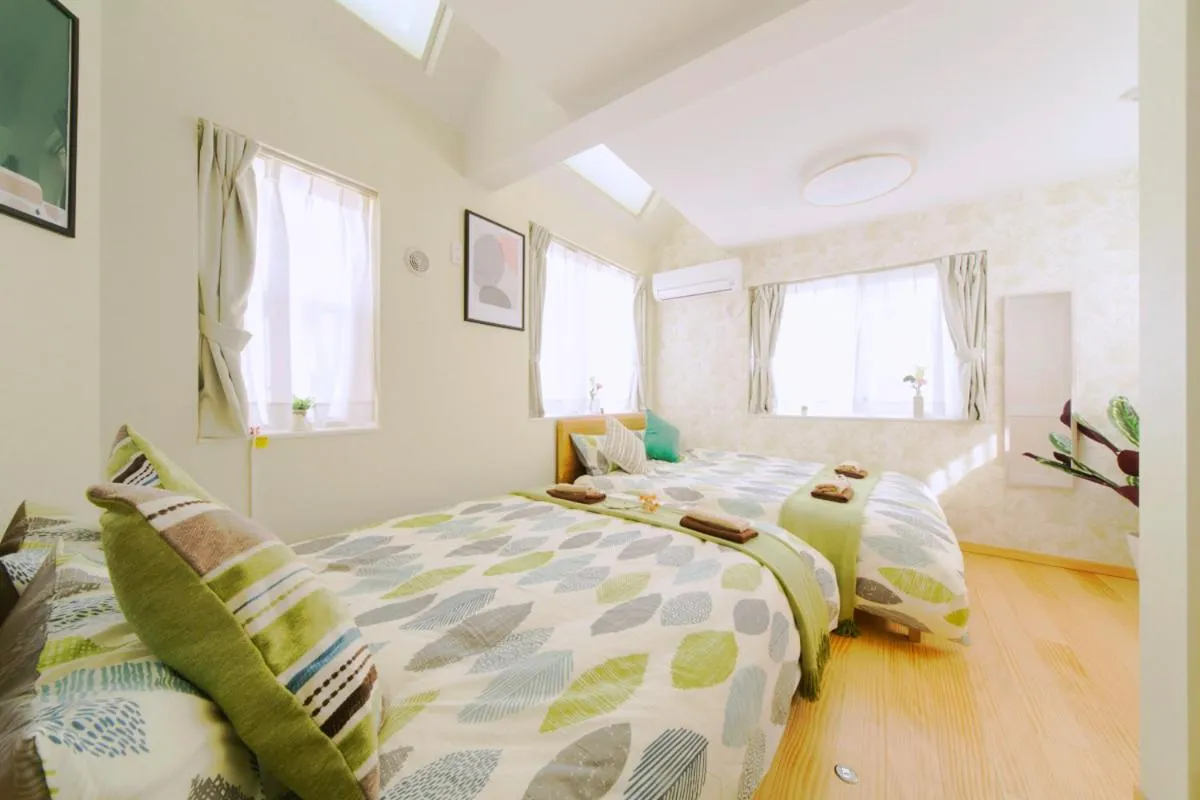 Bed in nestay villa tokyo otsuka