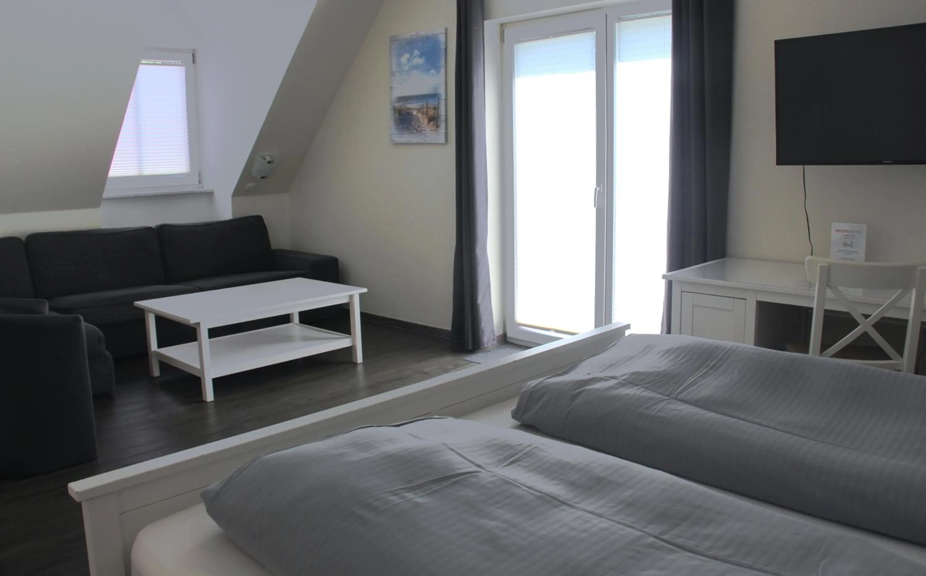 TV and multimedia, Bed in REGIOHOTEL Schanzenhaus Wernigerode - #Wellnessbereich #NaturAuszeitHarz #RuhigAmWald #FreeParking