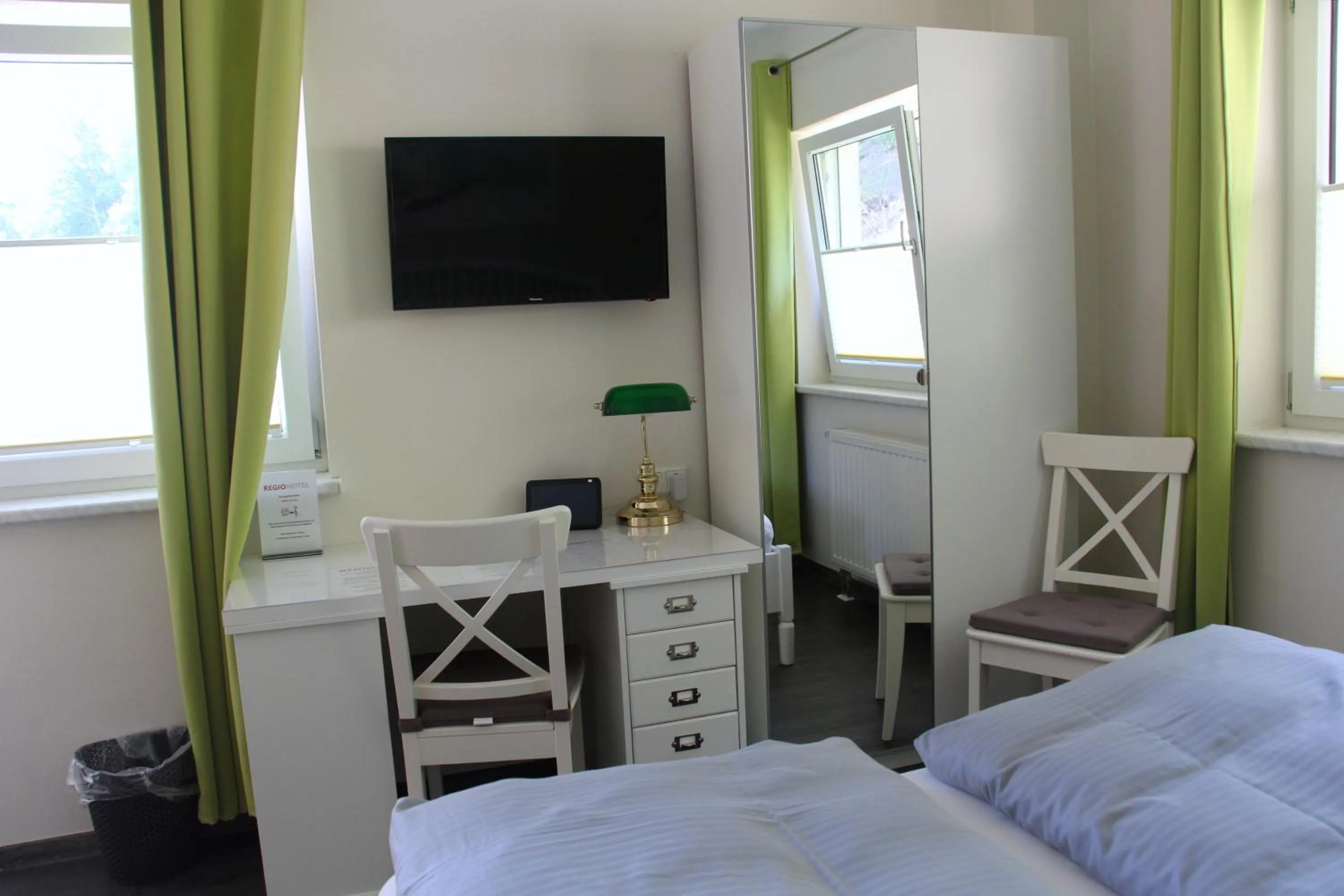 Photo of the whole room, Bed in REGIOHOTEL Schanzenhaus Wernigerode - #Wellnessbereich #NaturAuszeitHarz #RuhigAmWald #FreeParking