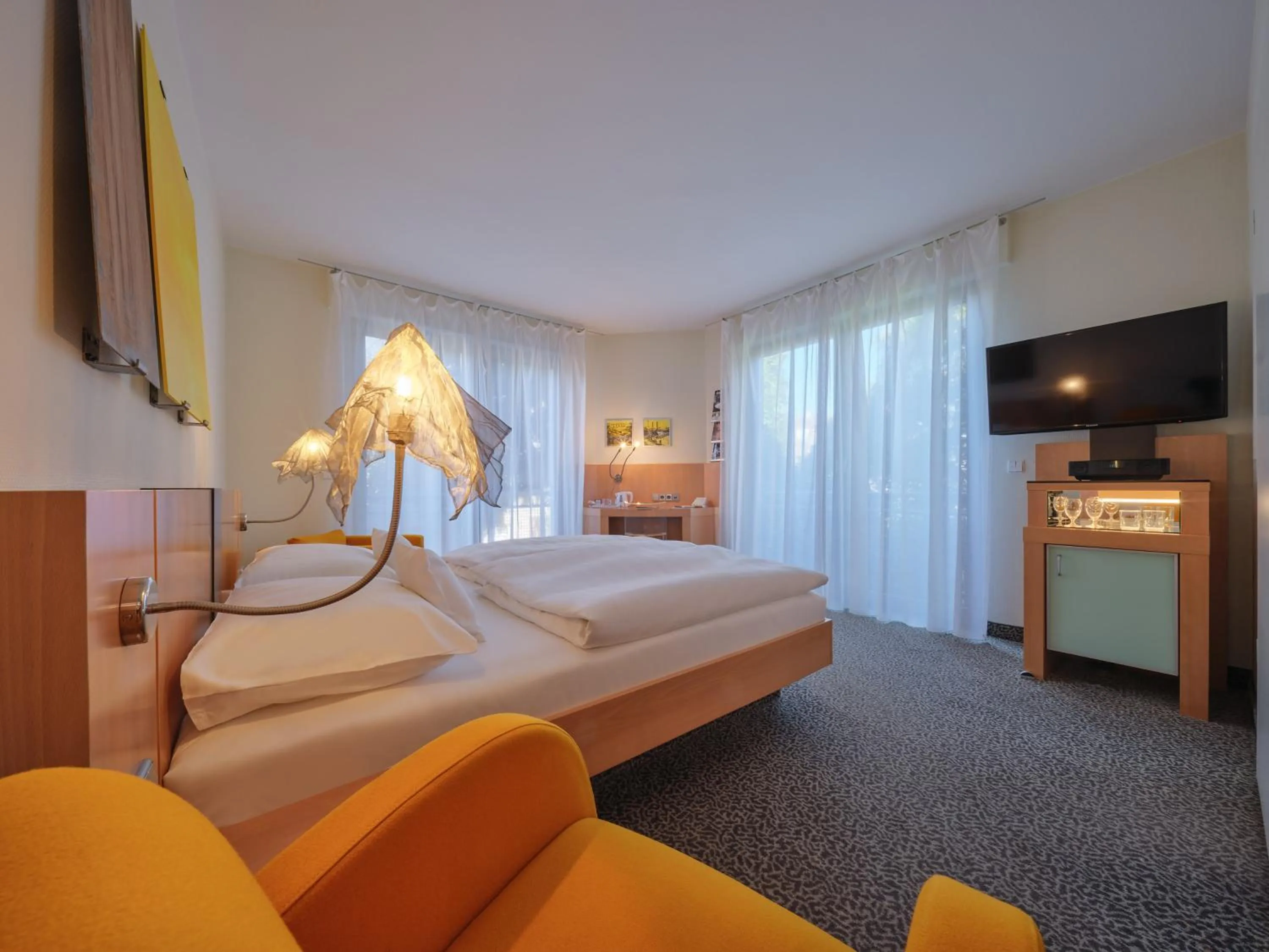 Photo of the whole room, Bed in Mintrops Stadt Hotel Margarethenhöhe