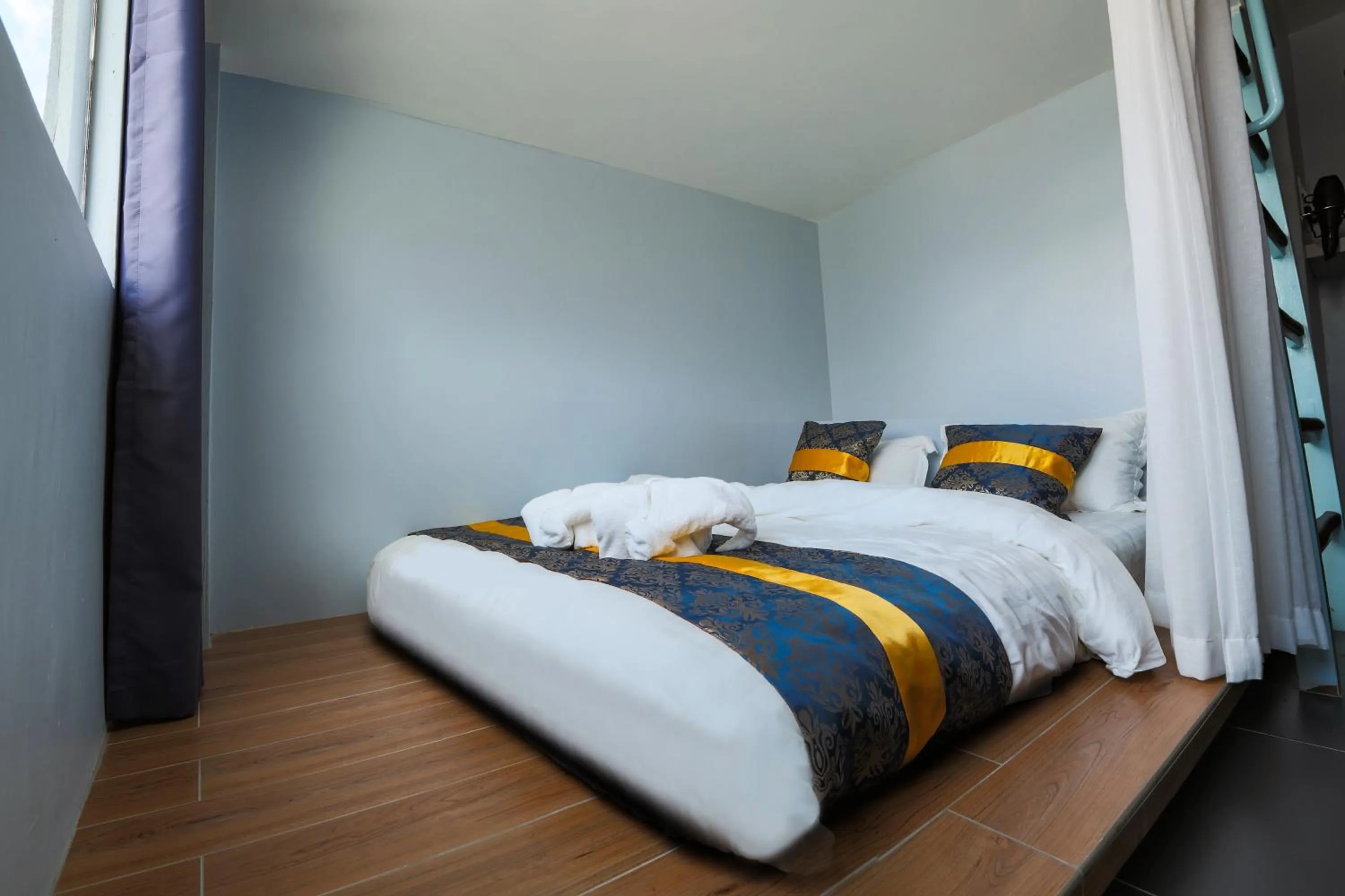 Bed in Top Garden Hotel