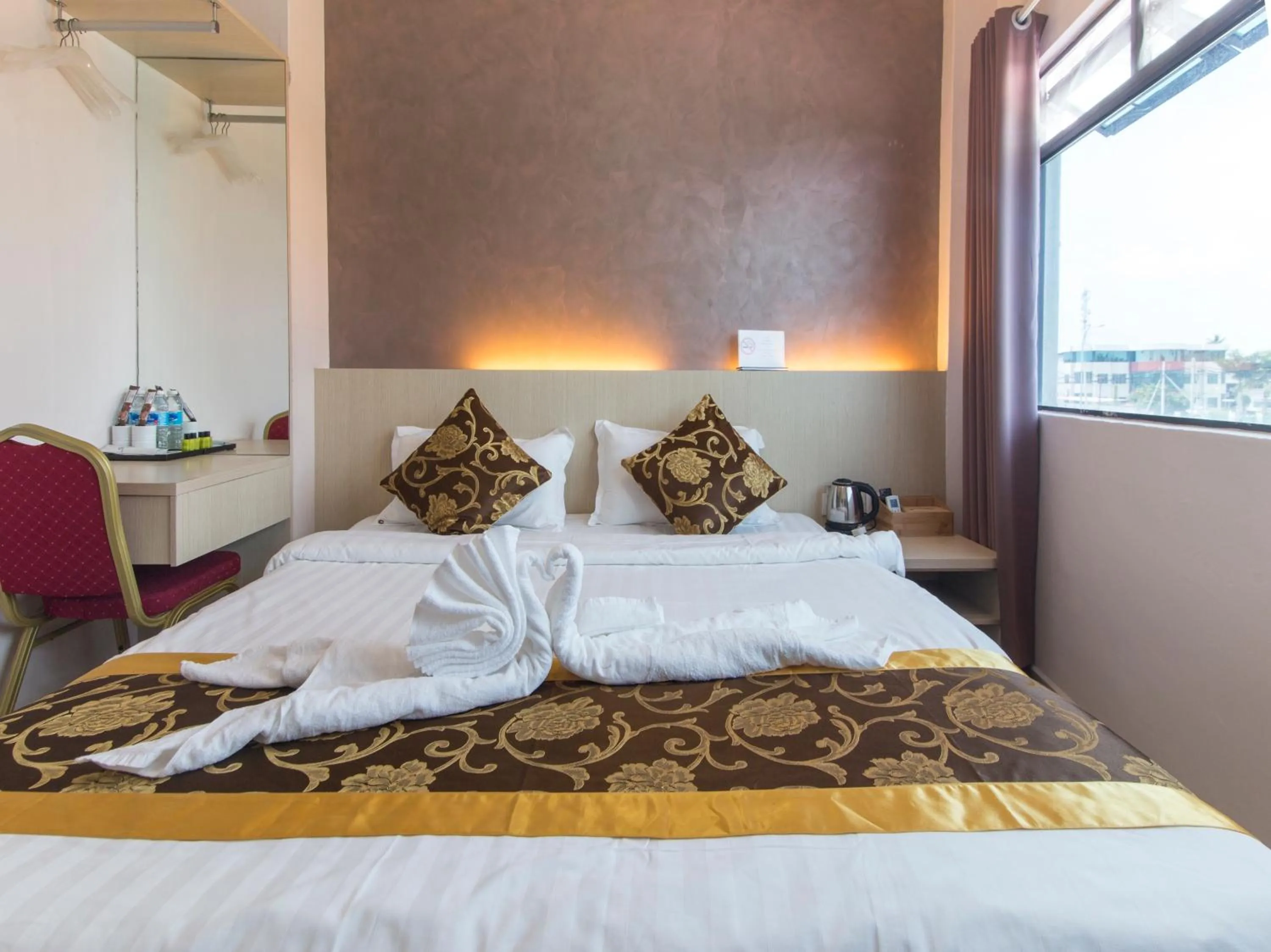 Bed in Top Garden Hotel