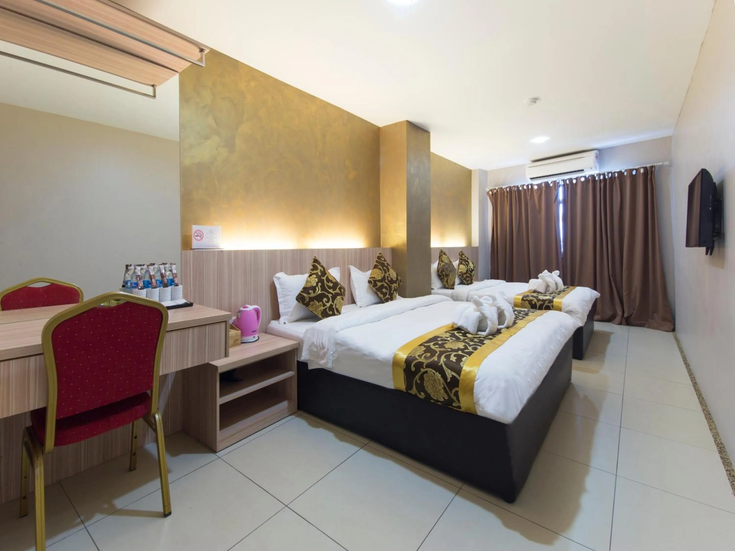 Bed in Top Garden Hotel