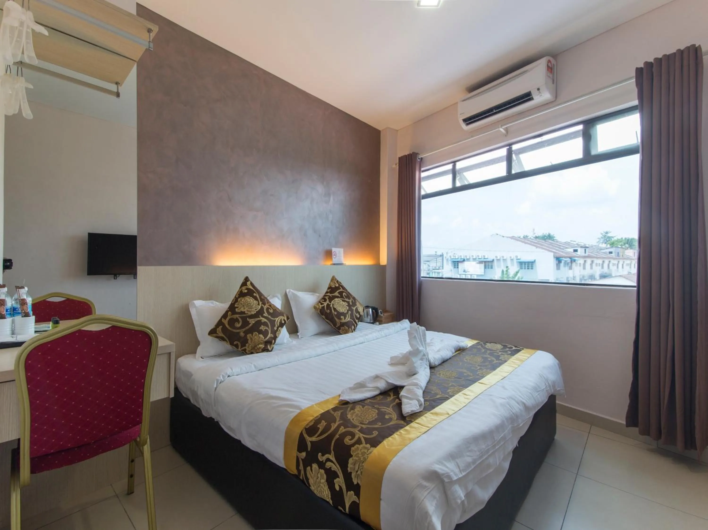 Bed in Top Garden Hotel