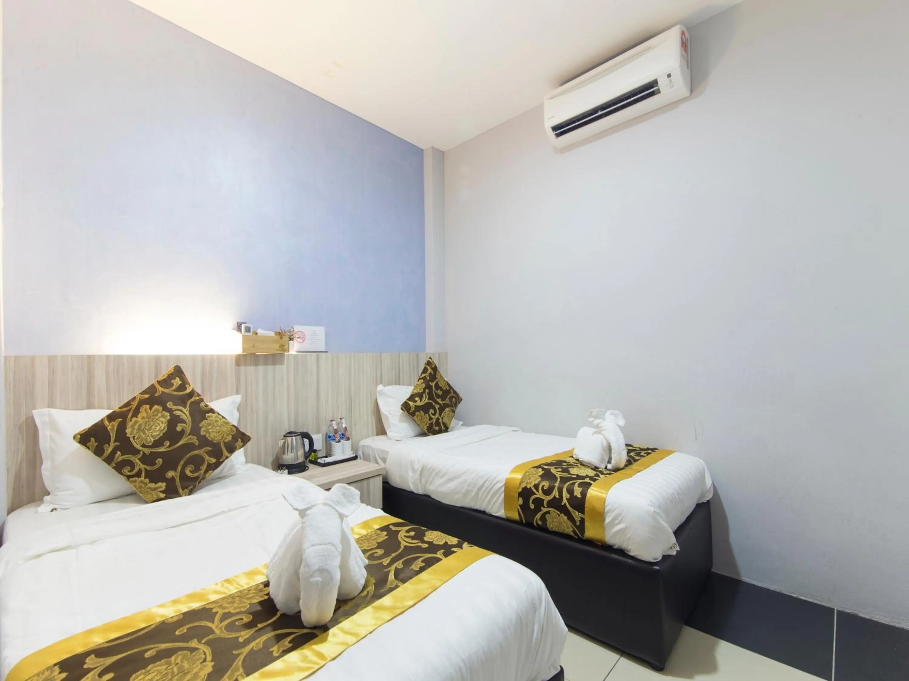 Bed in Top Garden Hotel