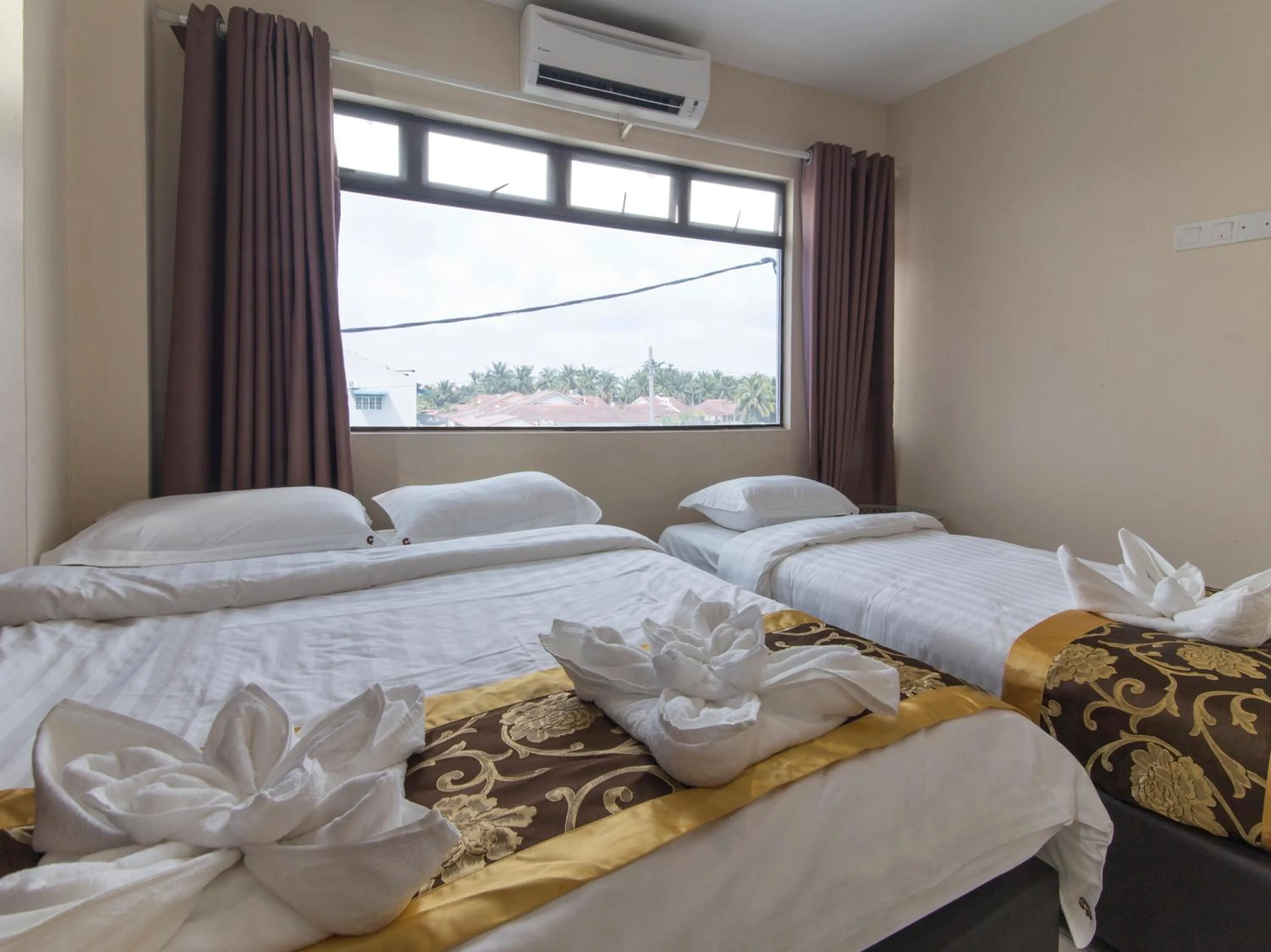 Bed in Top Garden Hotel