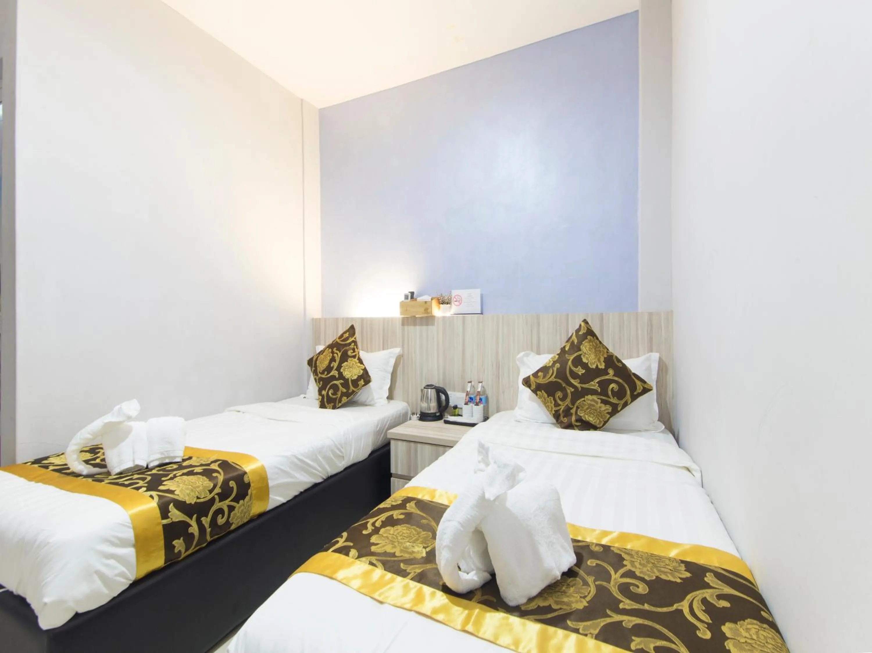 Bed in Top Garden Hotel