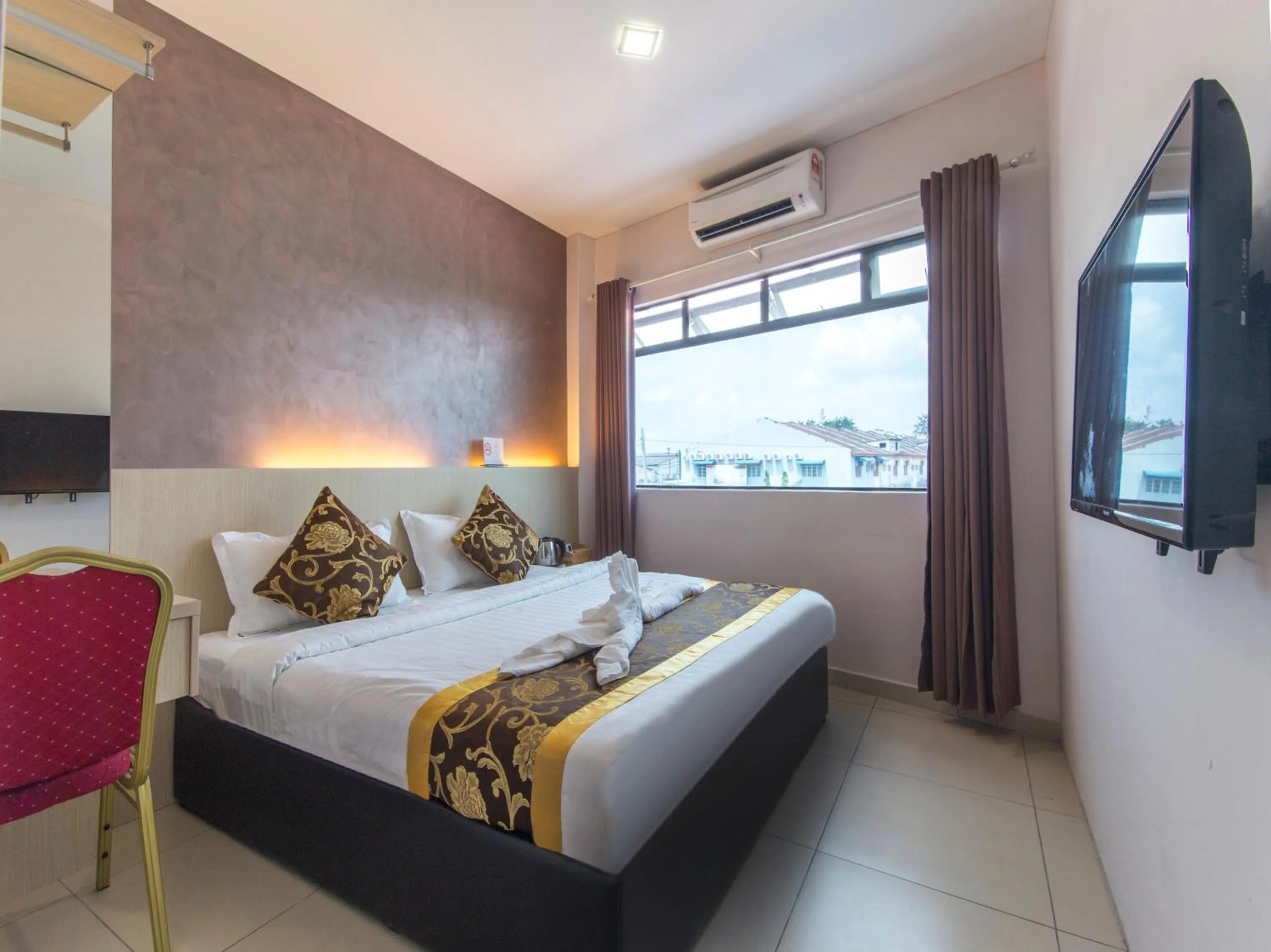 Bed in Top Garden Hotel